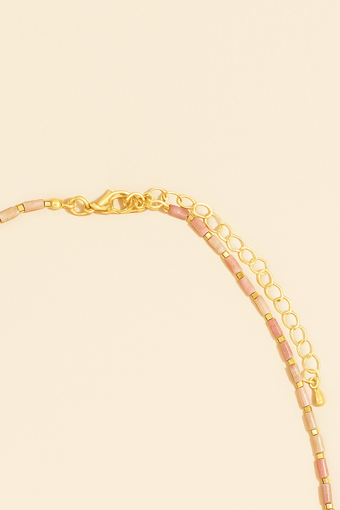 Delicate blush beaded pearl necklace from Larrea Cove's new arrivals, embodying a boho coastal elegance in jewelry design.