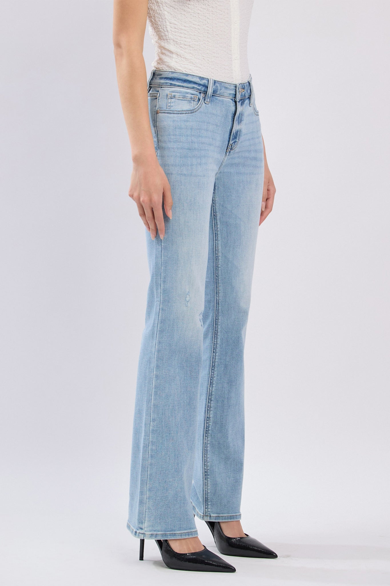 Eunina Imogen Bootcut Jeans in Drift, perfect for a boho coastal vibe, harmonizing with Larrea Cove's effortless style.