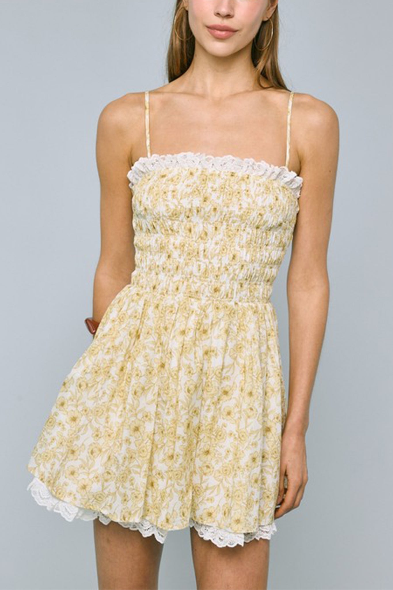 Embrace seaside charm with Larrea Cove's floral lace mini dress, blending boho elegance and coastal allure in our dresses collection.