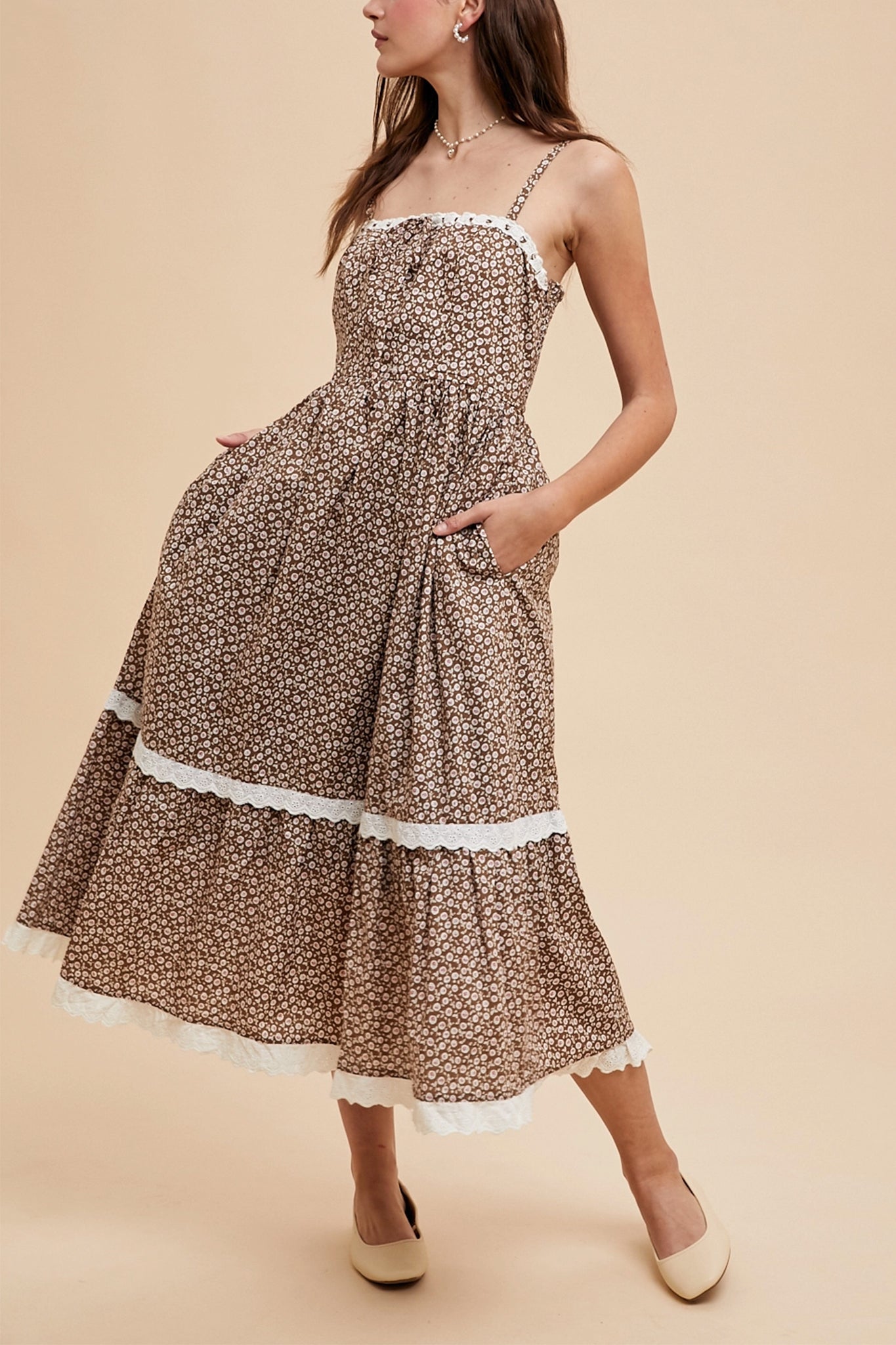 Embrace boho elegance with Larrea Cove's lace overlay maxi dress, featuring intricate lace details and flowing silhouette, perfect for coastal escapes.
