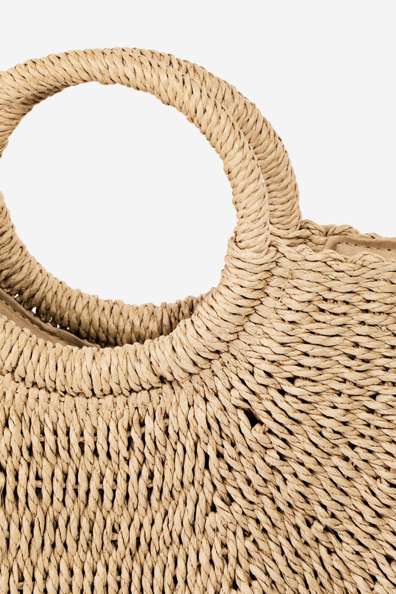 Marra circle handle straw bag in tan with elegant O-ring detail, a chic accessory from Larrea Cove's new arrivals.
