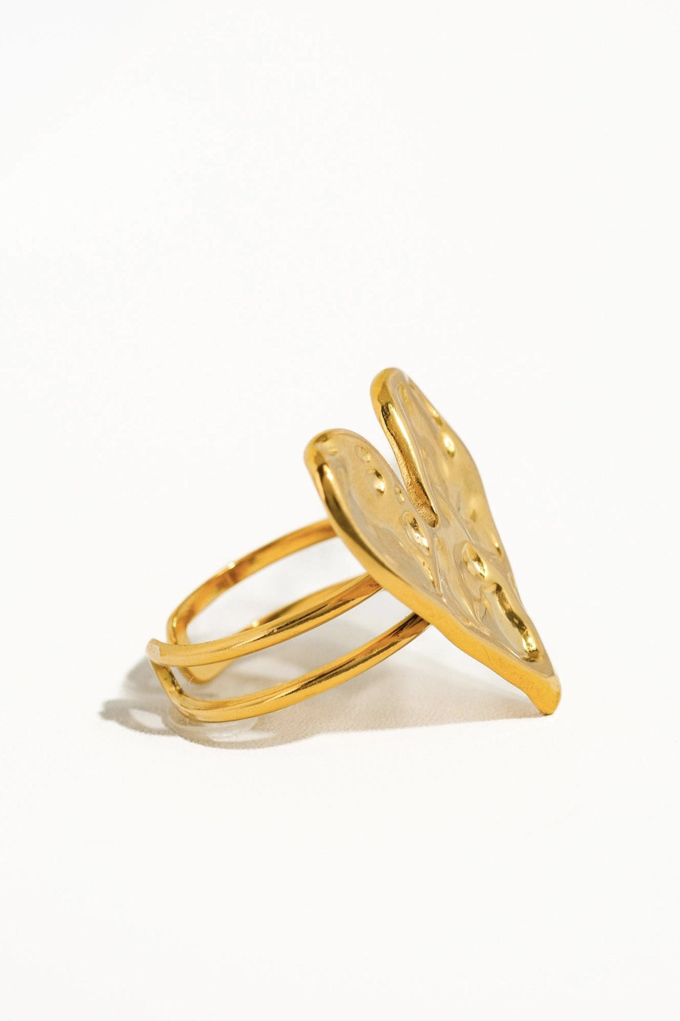 Embrace boho elegance with Larrea Cove's abstract heart ring in gold, a new-arrival accessory perfect for any jewelry lover.