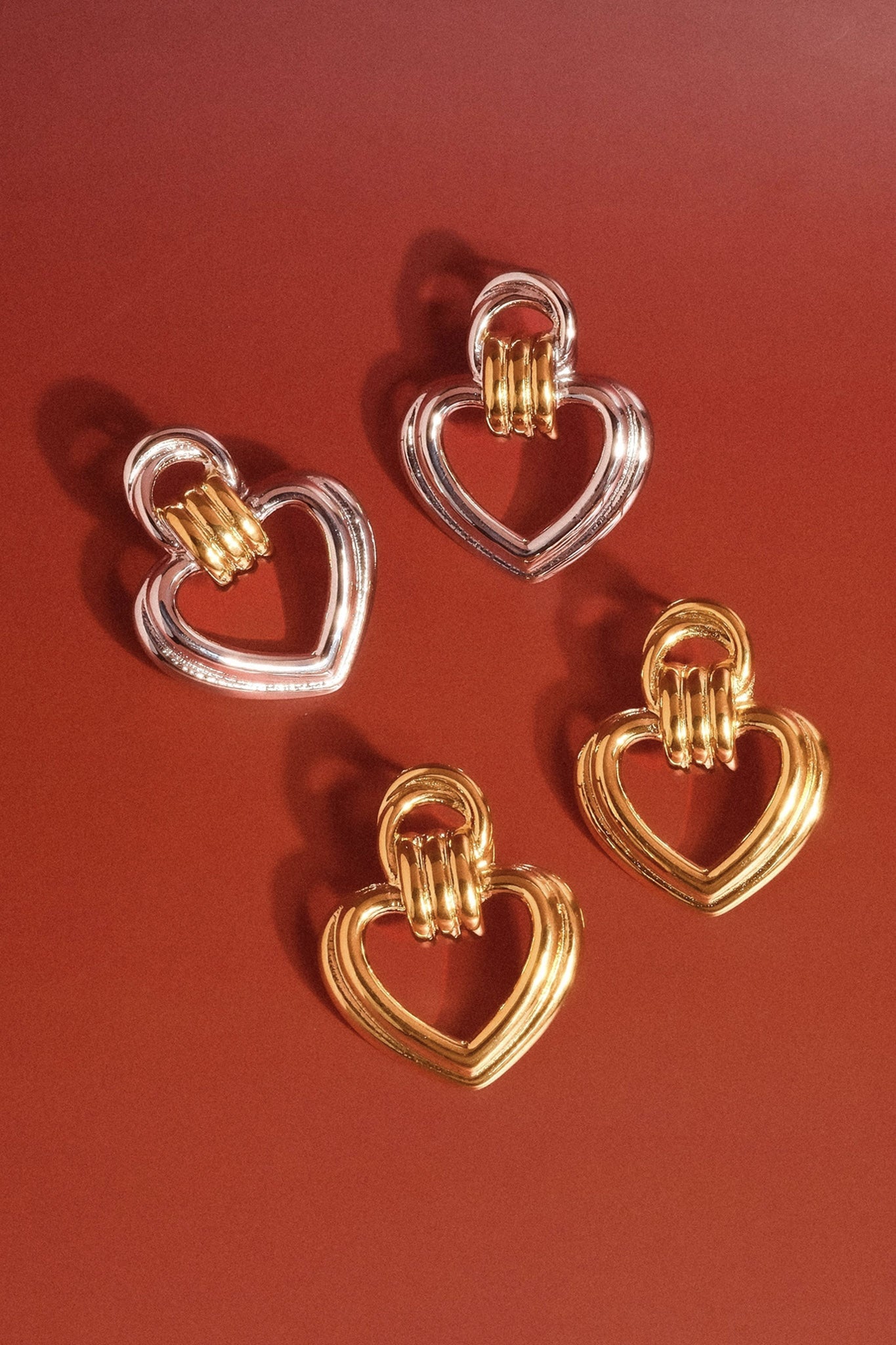 Elegant yellow gold heart hoops from Larrea Cove's new arrivals, perfect for adding a boho touch to any jewelry collection.