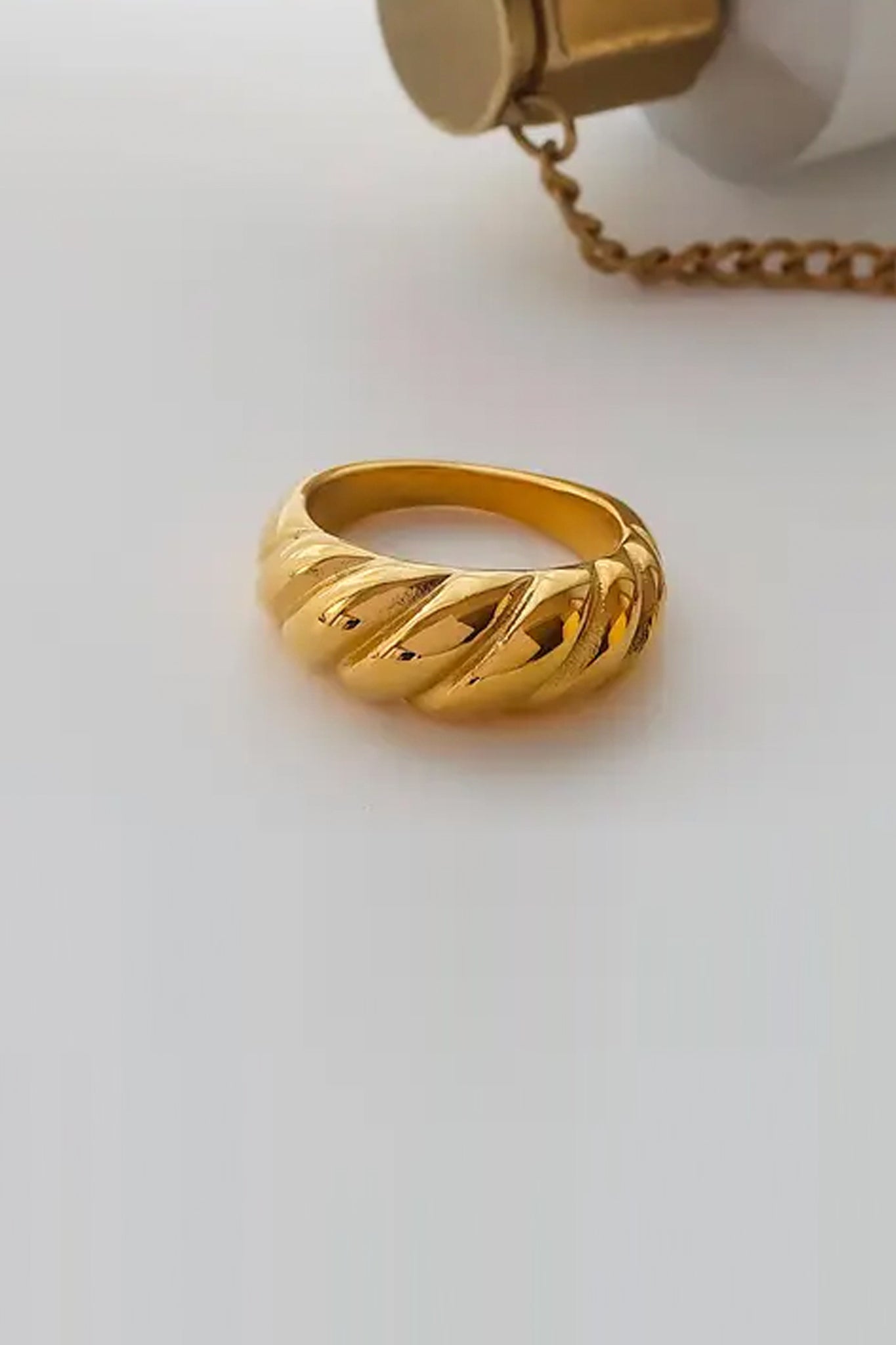 Larrea Cove's golden croissant ring exudes boho elegance, with its non-tarnish finish, perfect for accessorizing any ensemble.