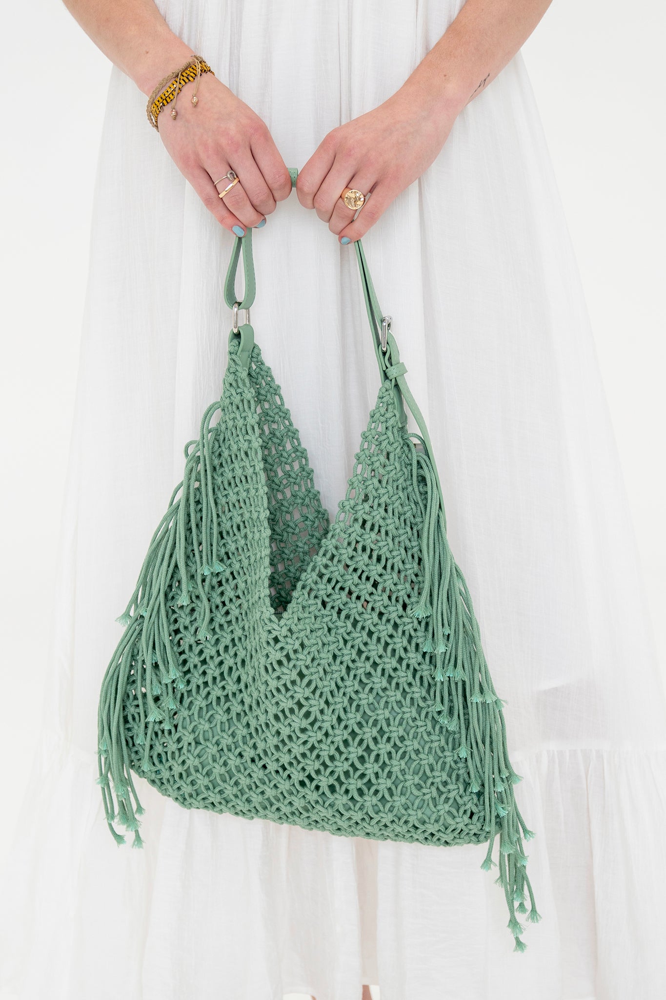 View 1 of Ariel Crochet Hobo Bag in Sage, a Bags from Larrea Cove. Detail: Ariel is here to be yo...