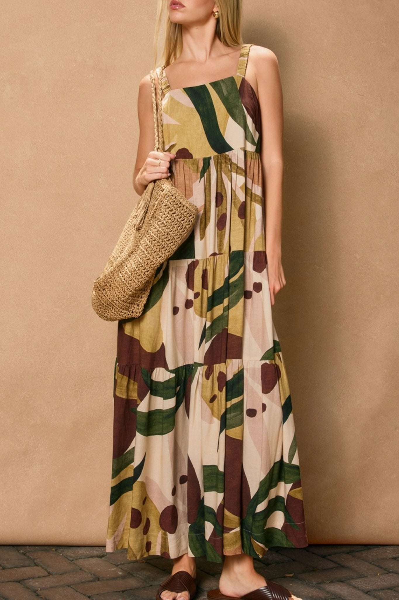 Margo babydoll tiered maxi dress embodies a boho spirit with its flowing silhouette, perfect for Larrea Cove's coastal vibe.