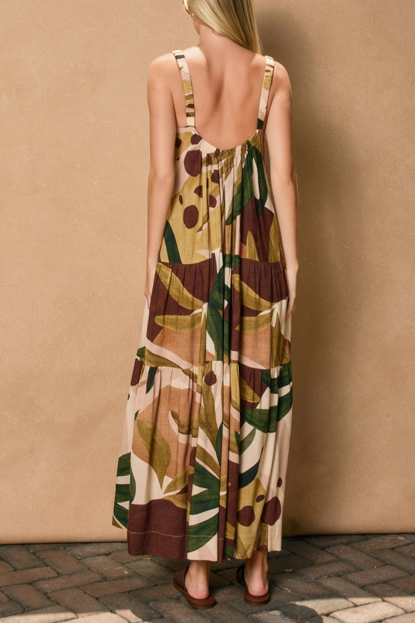 Embrace boho elegance with Larrea Cove's Margo Babydoll Tiered Maxi Dress, featuring soft tiers and flowing coastal charm.