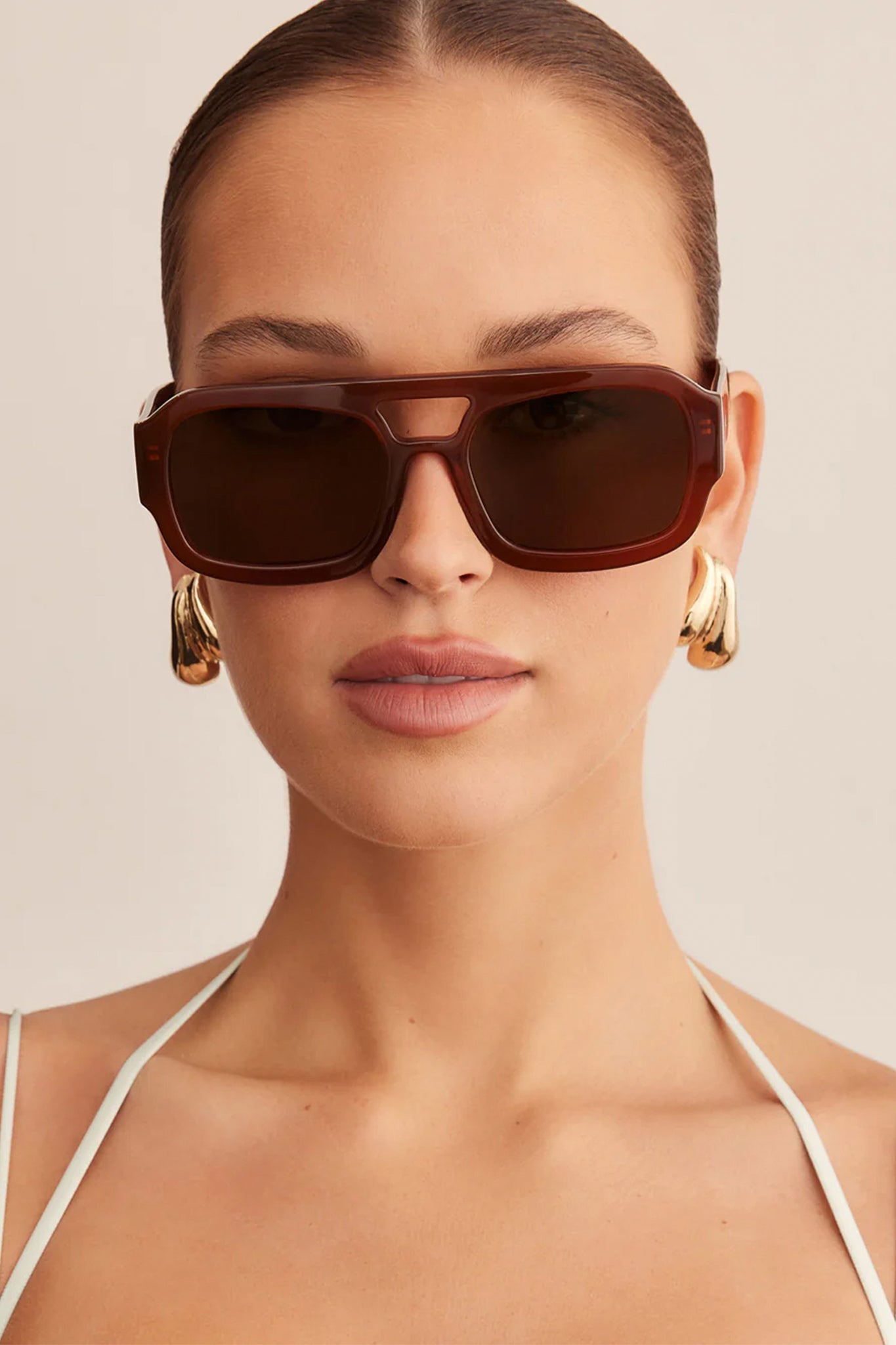 The Suki in cinnamon cinnamon offers boho charm with warm hues, perfect for Larrea Cove's new-arrivals accessories collection.