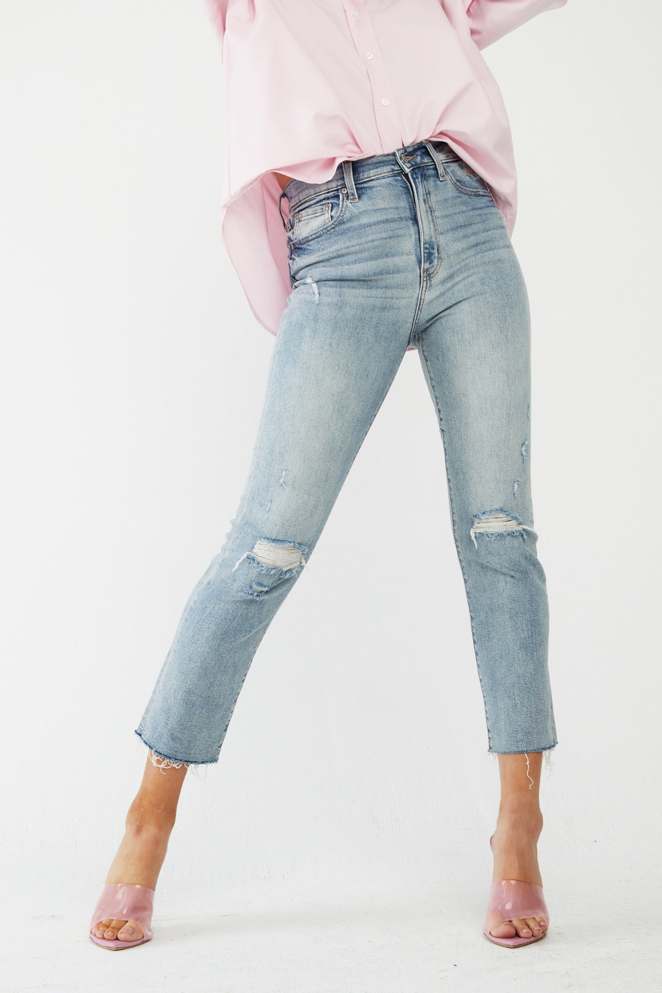 Eunina Ally Straight Jeans in Saguaro, featuring a light green color with a straight leg design. Accompanied by sunglasses, the jeans are part of the Eunina brand's new collection. Tags include jeans, coupon, restock, and relevant dates.
