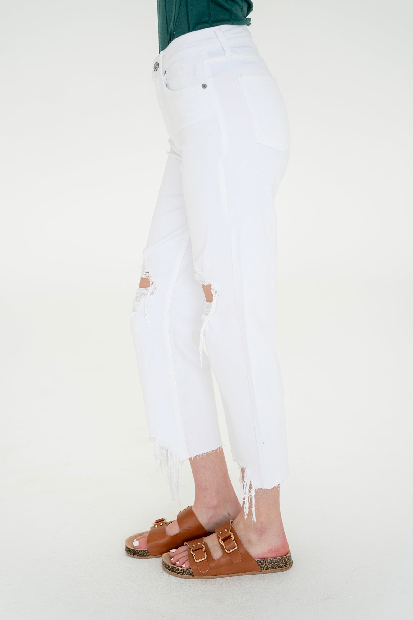 Eunina Dawn Wide Leg Jeans in Datura, featuring a relaxed fit and light wash, displayed alongside stylish sunglasses. The image promotes the product as part of a spring sale, highlighting its monochrome design and new arrival for March 2023.