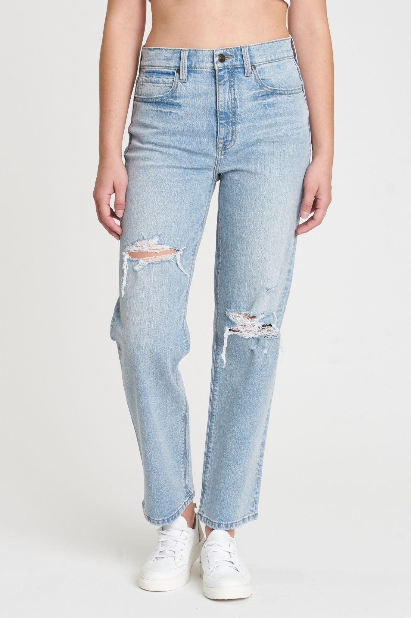 Eunina Olsen Straight Leg Jeans in Polem, featuring a classic straight leg design and a medium wash denim finish. The jeans are styled on a flat surface with sunglasses placed nearby, highlighting a casual, trendy look.
