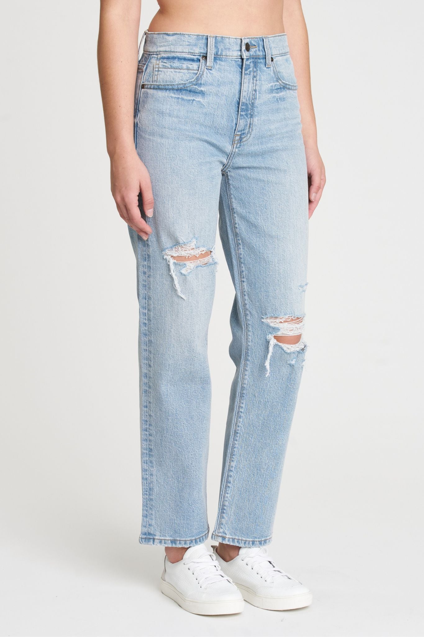 Eunina Olsen Straight Leg Jeans in Polem, featuring a classic straight leg cut and a medium wash denim. The jeans are styled with casual sunglasses, showcasing a trendy look perfect for everyday wear.