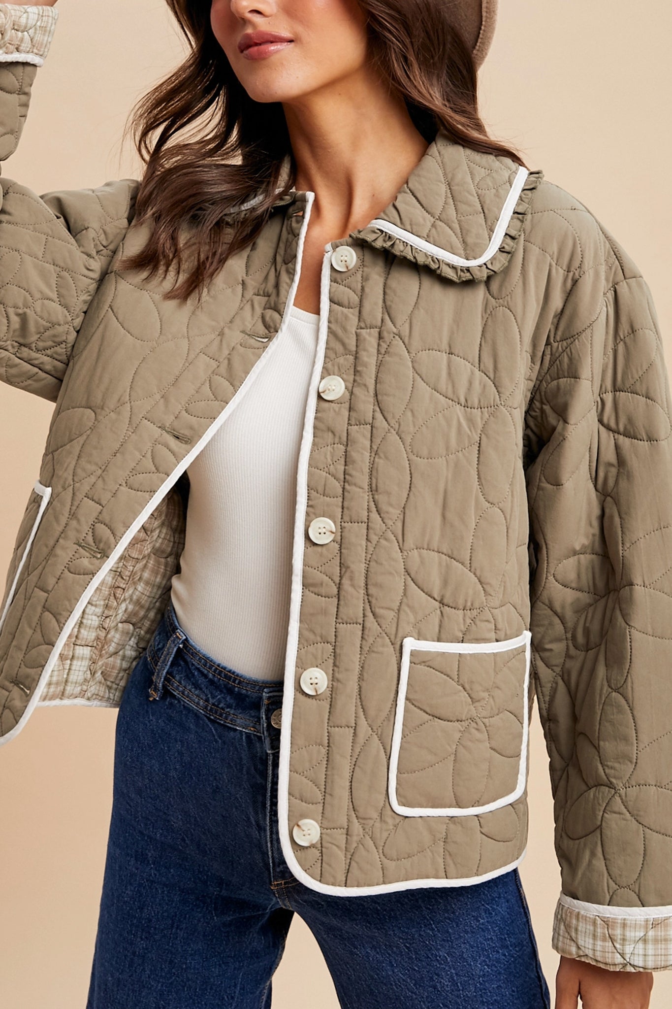 Olive Meadow Trail quilted jacket from Larrea Cove, a boho-chic outerwear piece perfect for coastal adventures and new arrivals.