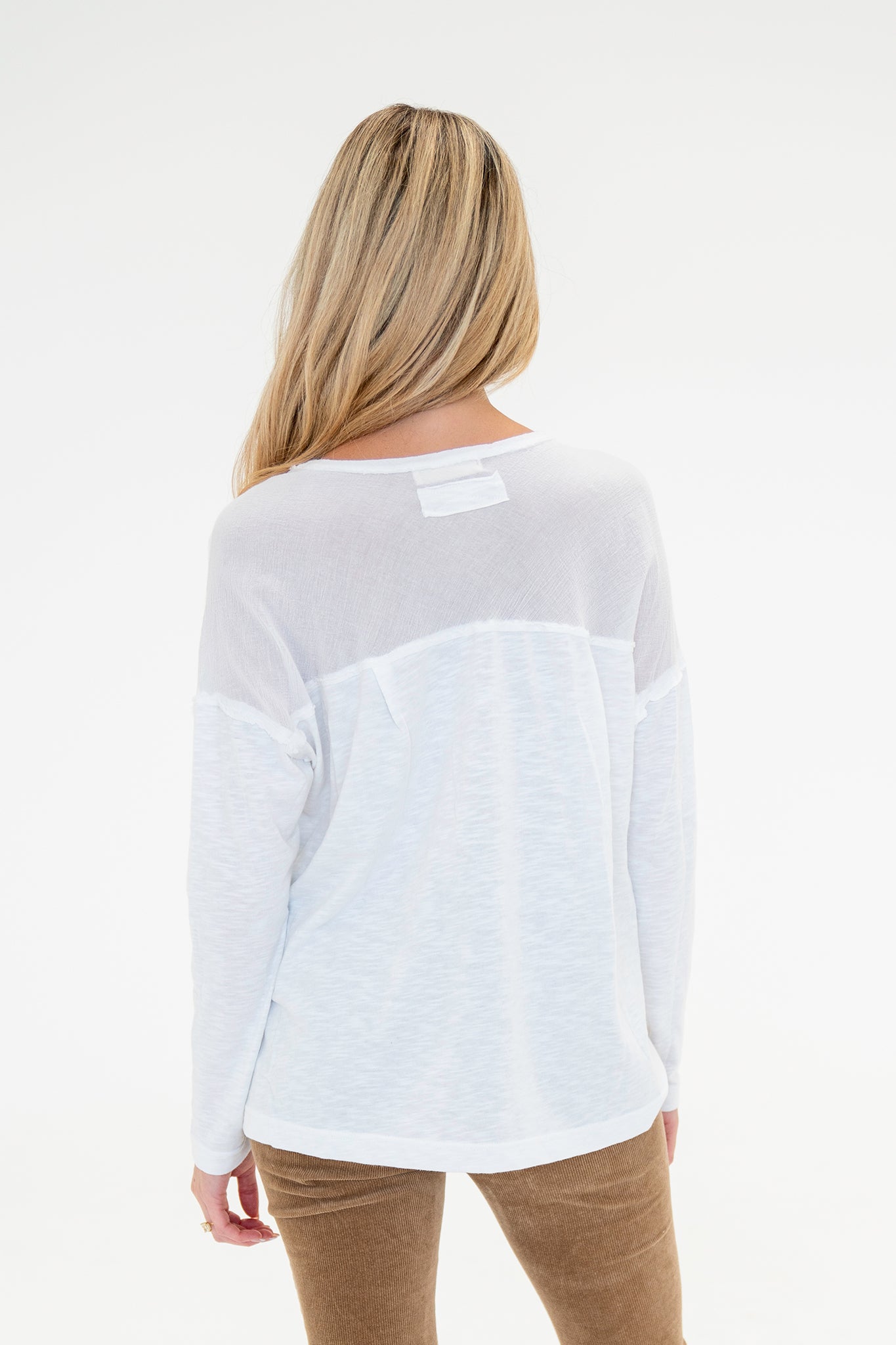 View 3 of Freesia Henley in Off White, a Tops from Larrea Cove. Detail: .