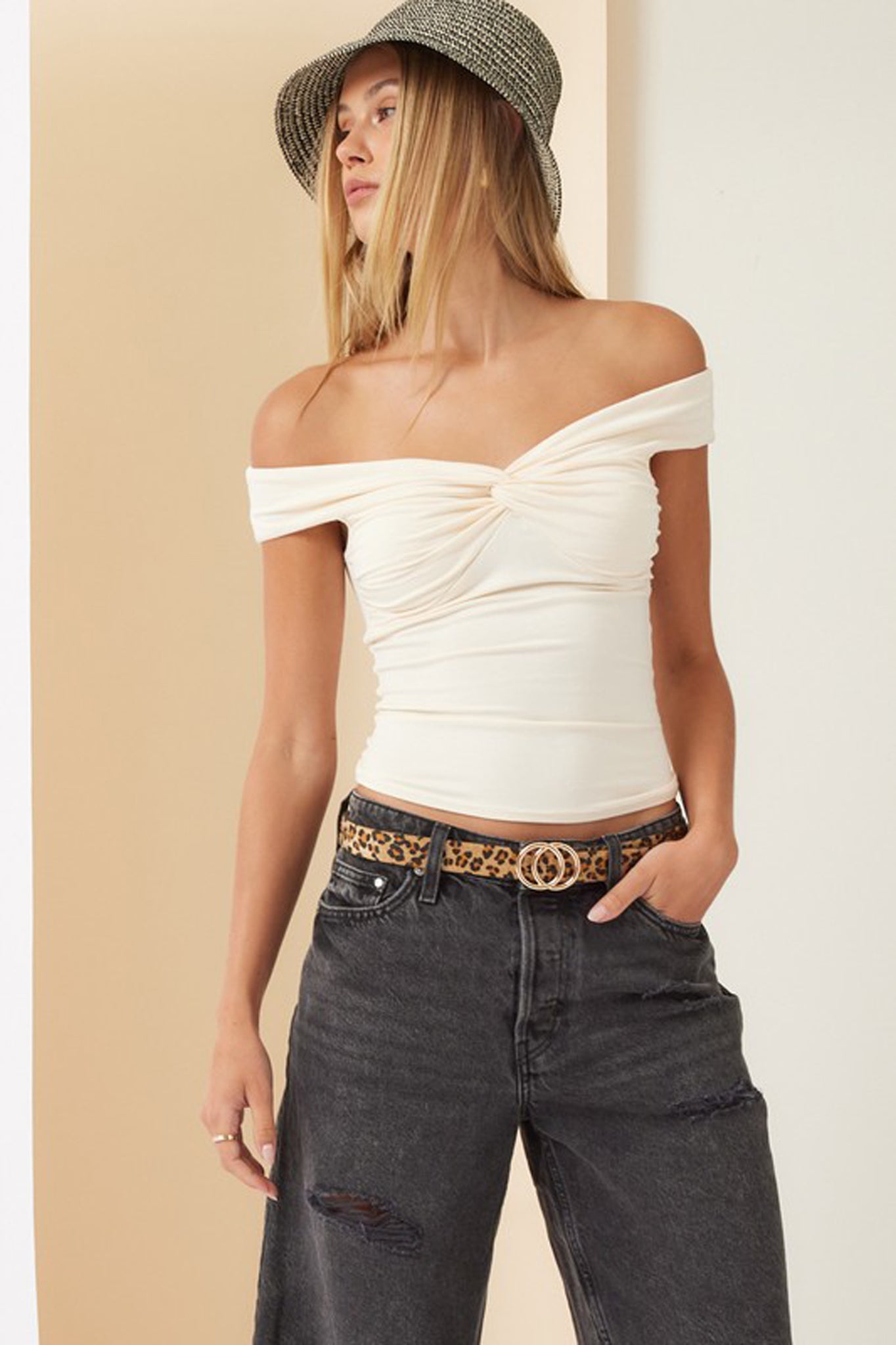 Off-shoulder cream top from Larrea Cove, featuring a relaxed fit and stylish design, ideal for fall 2024 fashion.