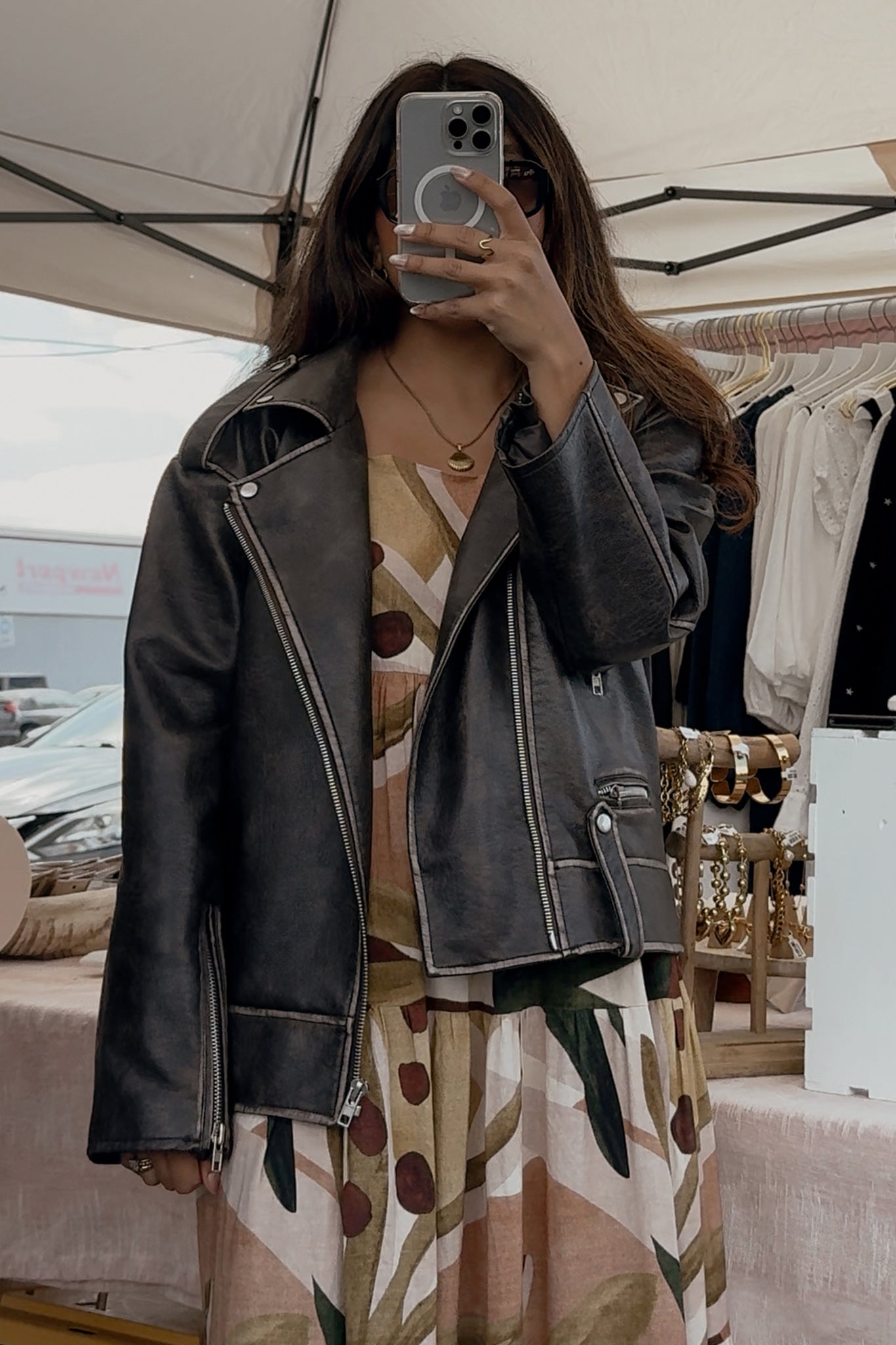 Embrace coastal vibes in Larrea Cove's oversized moto jacket, perfect for layering in boho outerwear collections, new arrivals.