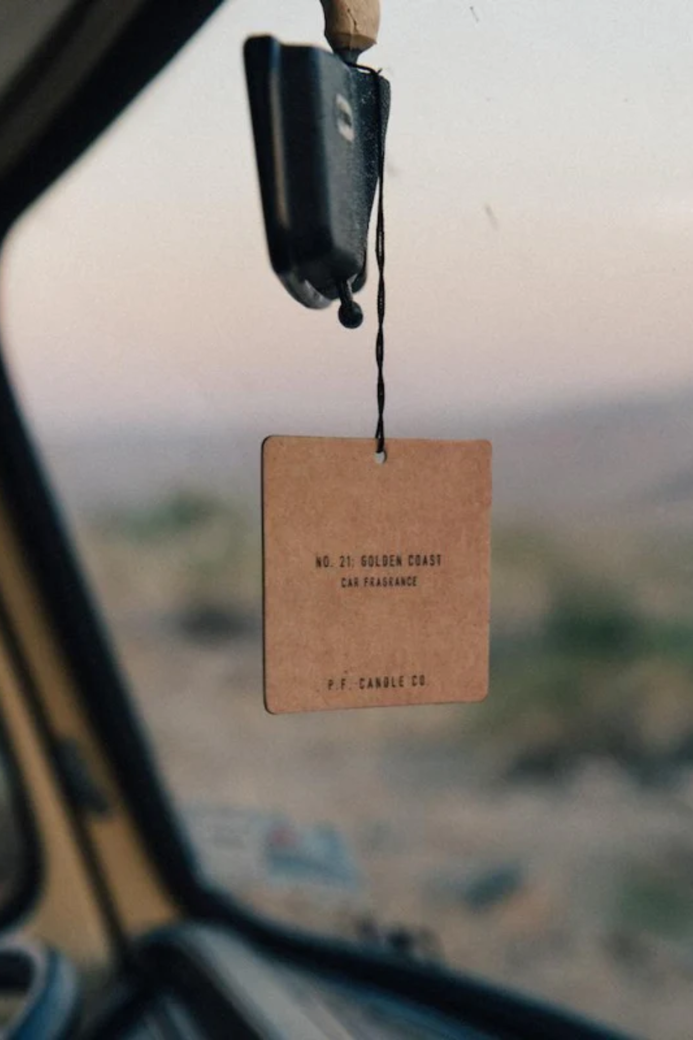 P.F. Candle Co. Golden Coast car fragrance 2-pack, capturing coastal scents in stylish packaging from Larrea Cove's new arrivals collection.