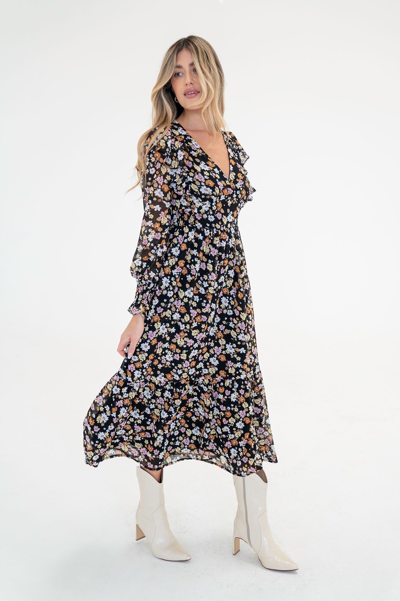 View 1 of Pansies Floral Midi Dress, a Dresses from Larrea Cove. Detail: We've got just the dress you need to l...