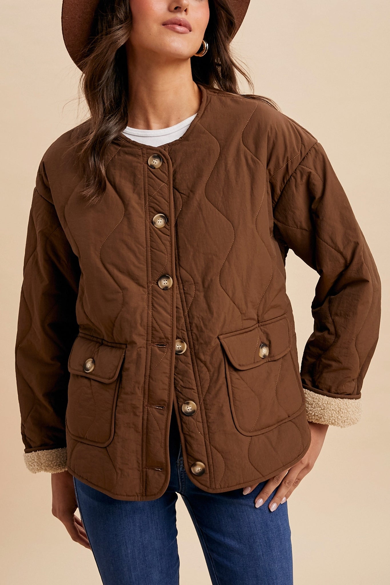 Highland sherpa-lined quilted jacket in warm chestnut, perfect for boho coastal adventures from Larrea Cove's new arrivals collection