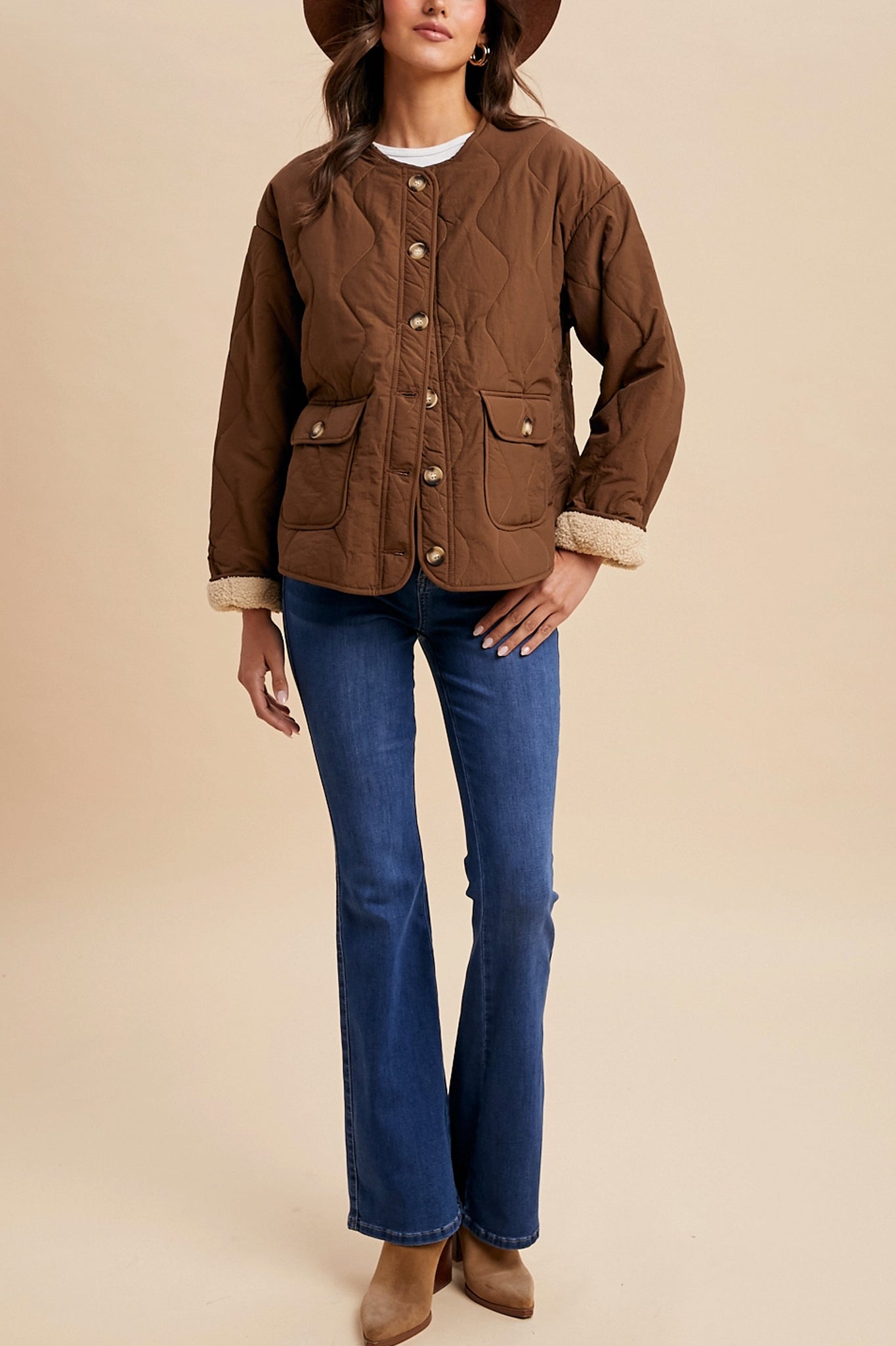 Highland sherpa-lined quilted jacket in chestnut, exuding warmth and comfort from Larrea Cove's new arrivals collection.