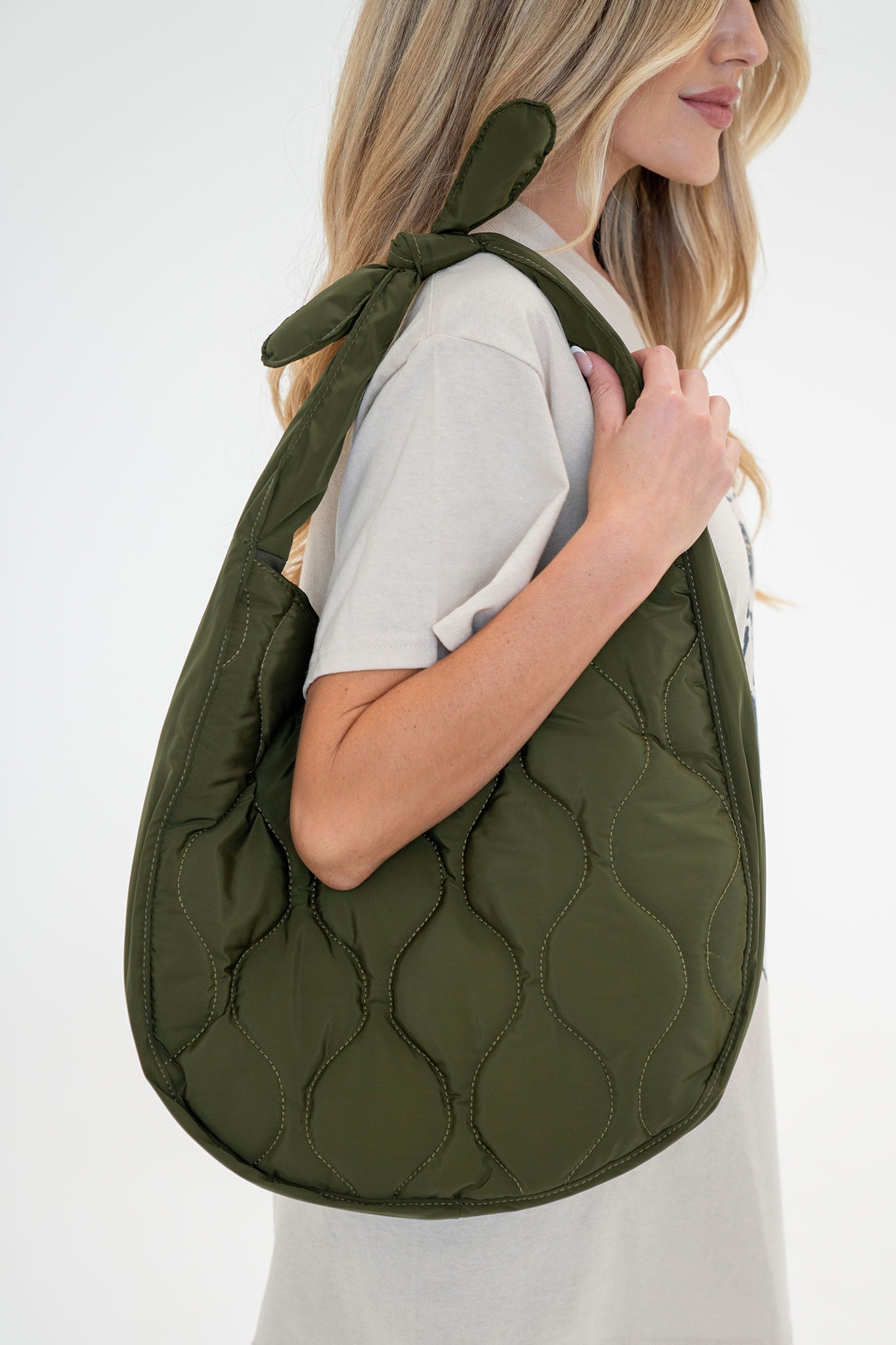 View 1 of Remi Top Knotted Tote, a Bags from Larrea Cove. Detail:
Introducing the perfect bag for t...