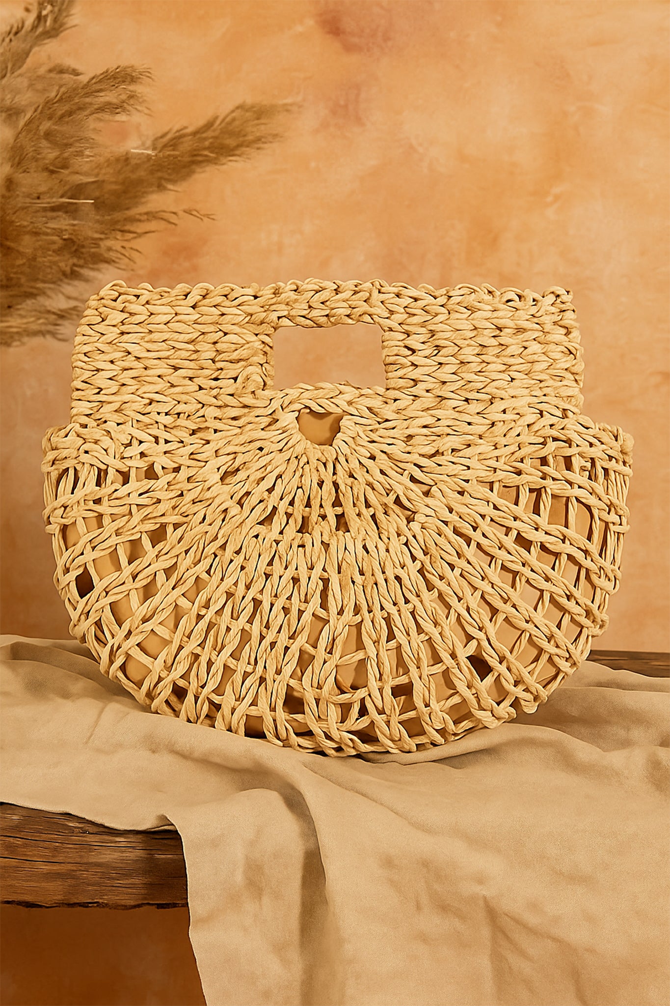 Ivory semi circle tote bag from Larrea Cove's new arrivals, a chic boho accessory for coastal adventures