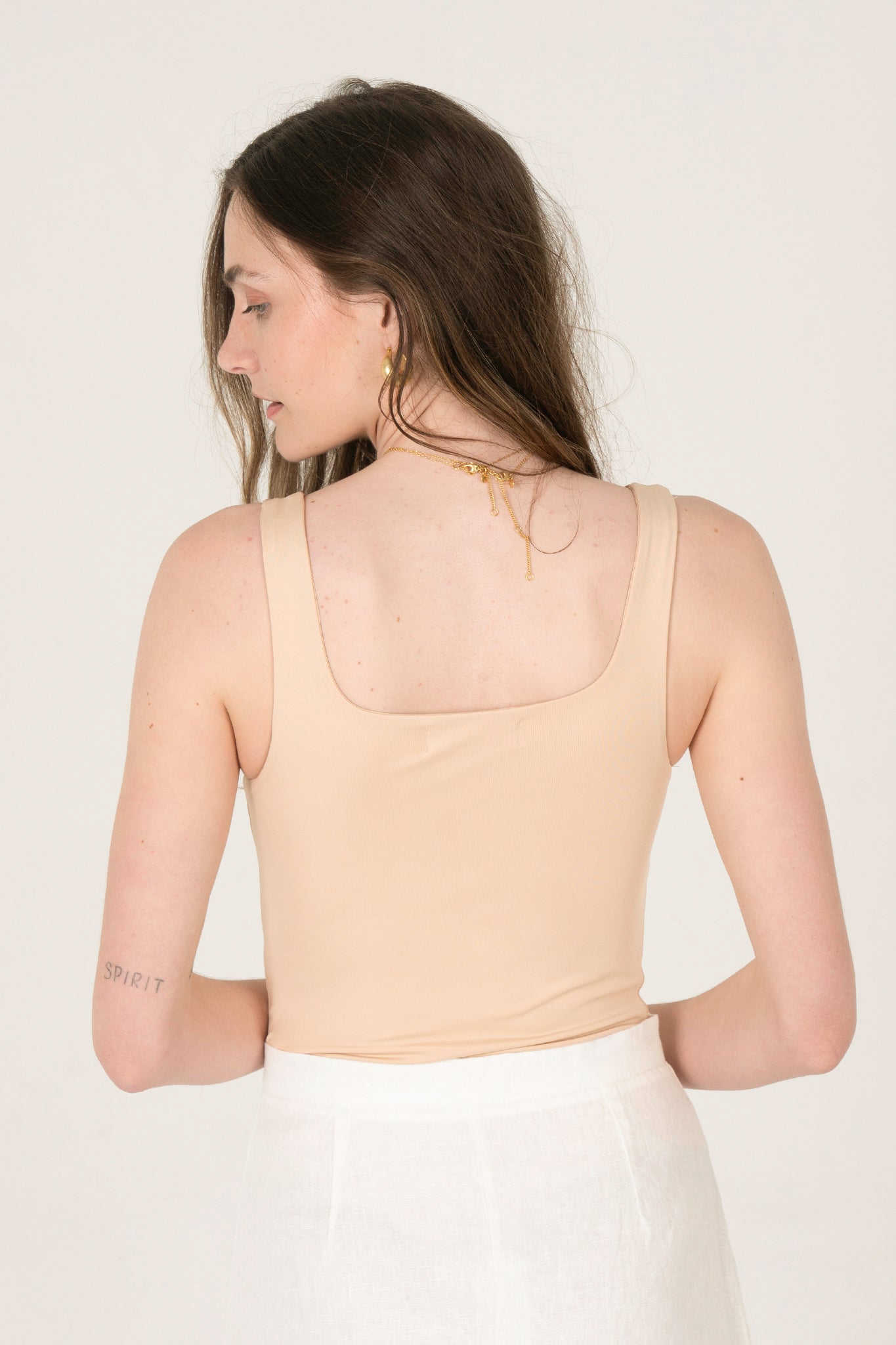 View 2 of Cara Square Neck Bodysuit in Nude, a Bodysuits from Larrea Cove. Detail: .