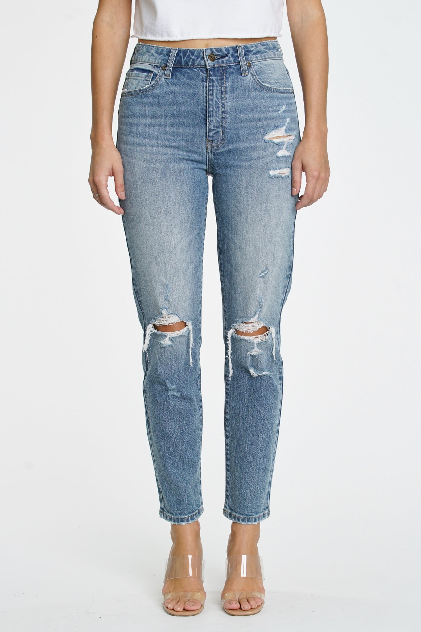 Alt text: A pair of Eunina Tobi Mom Jeans in Whipple, featuring a relaxed fit and classic denim style, displayed alongside stylish sunglasses. The jeans are part of the 2024 collection and are newly restocked. Tags include jeans, coupon, and vendor Eunina.