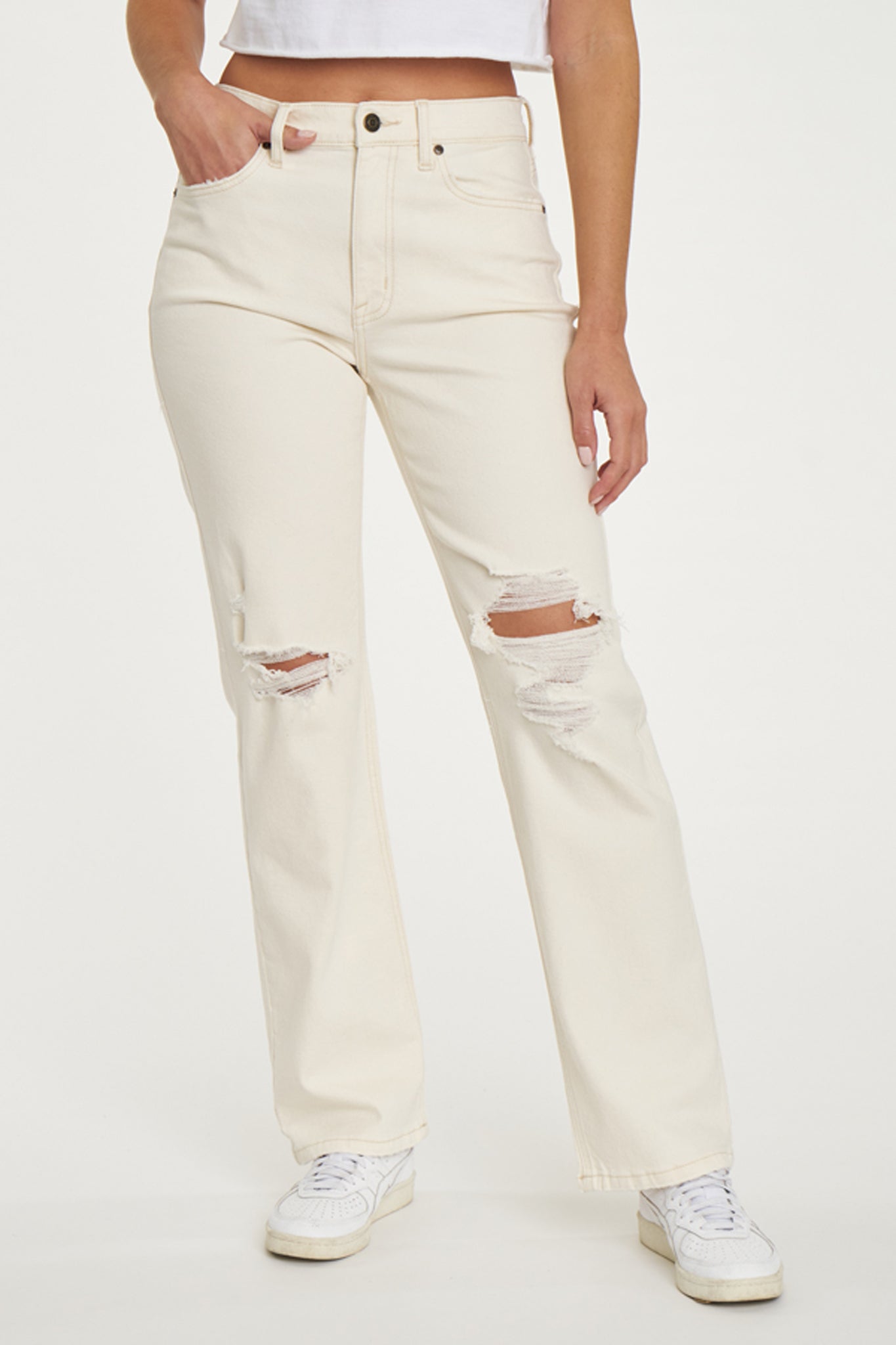 Eunina Codi Dad Jeans in Super Moon, featuring a relaxed fit and light wash denim. Styled with sunglasses, showcasing a trendy casual outfit. Part of a sale by Eunina, October 2023.
