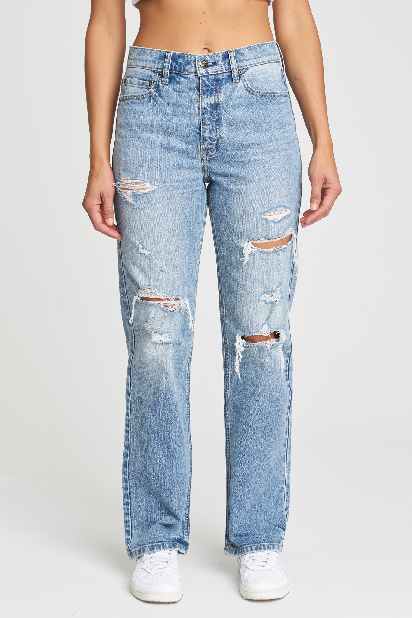 Eunina Codi Dad Jeans in Primrose, featuring a light pastel color, relaxed fit, and classic five-pocket styling. The jeans are displayed against a neutral background with a pair of stylish sunglasses nearby.