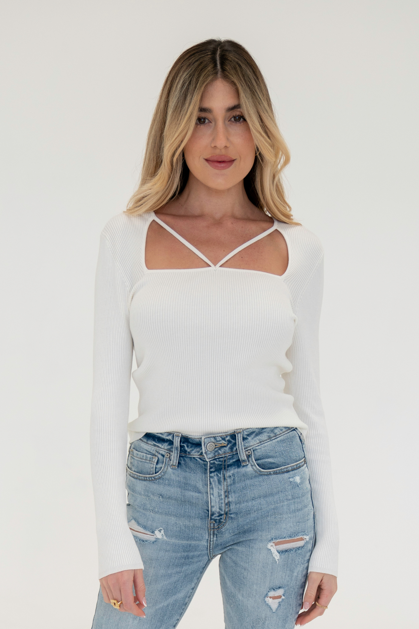 View 1 of Kala Long Sleeve Top, a Tops from Larrea Cove. Detail: If you're looking for an elevated basic that you can wear endless ways, the Kal...
