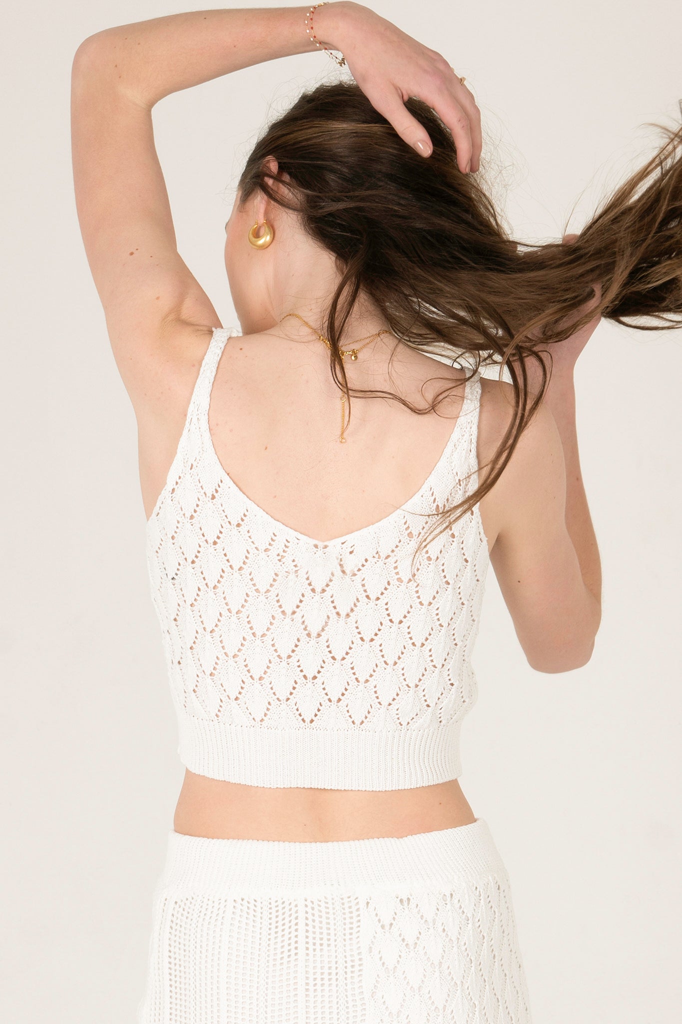 View 4 of Gaia Cropped Sweater Tank, a Tops from Larrea Cove. Detail: .