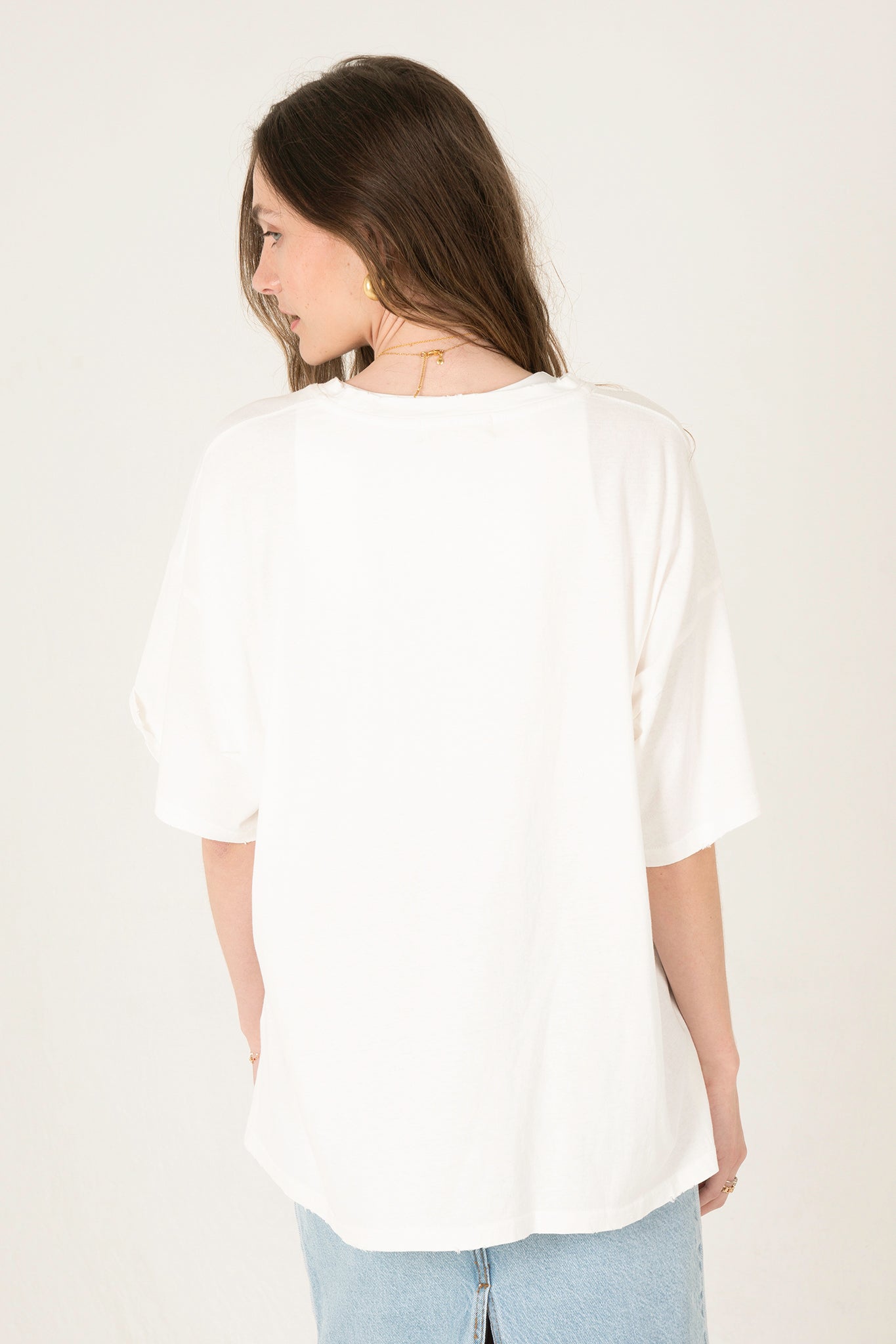 View 3 of Doire Crew Neck Tee in Off White, a Tops from Larrea Cove. Detail: .