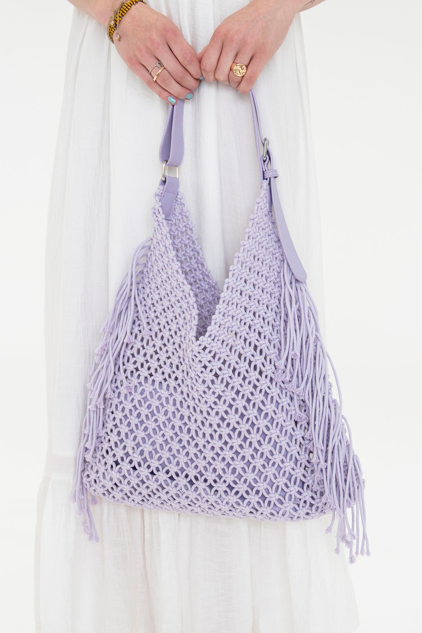 View 1 of Ariel Crochet Hobo Bag in Lilac, a Bags from Larrea Cove. Detail: Ariel is here to be y...