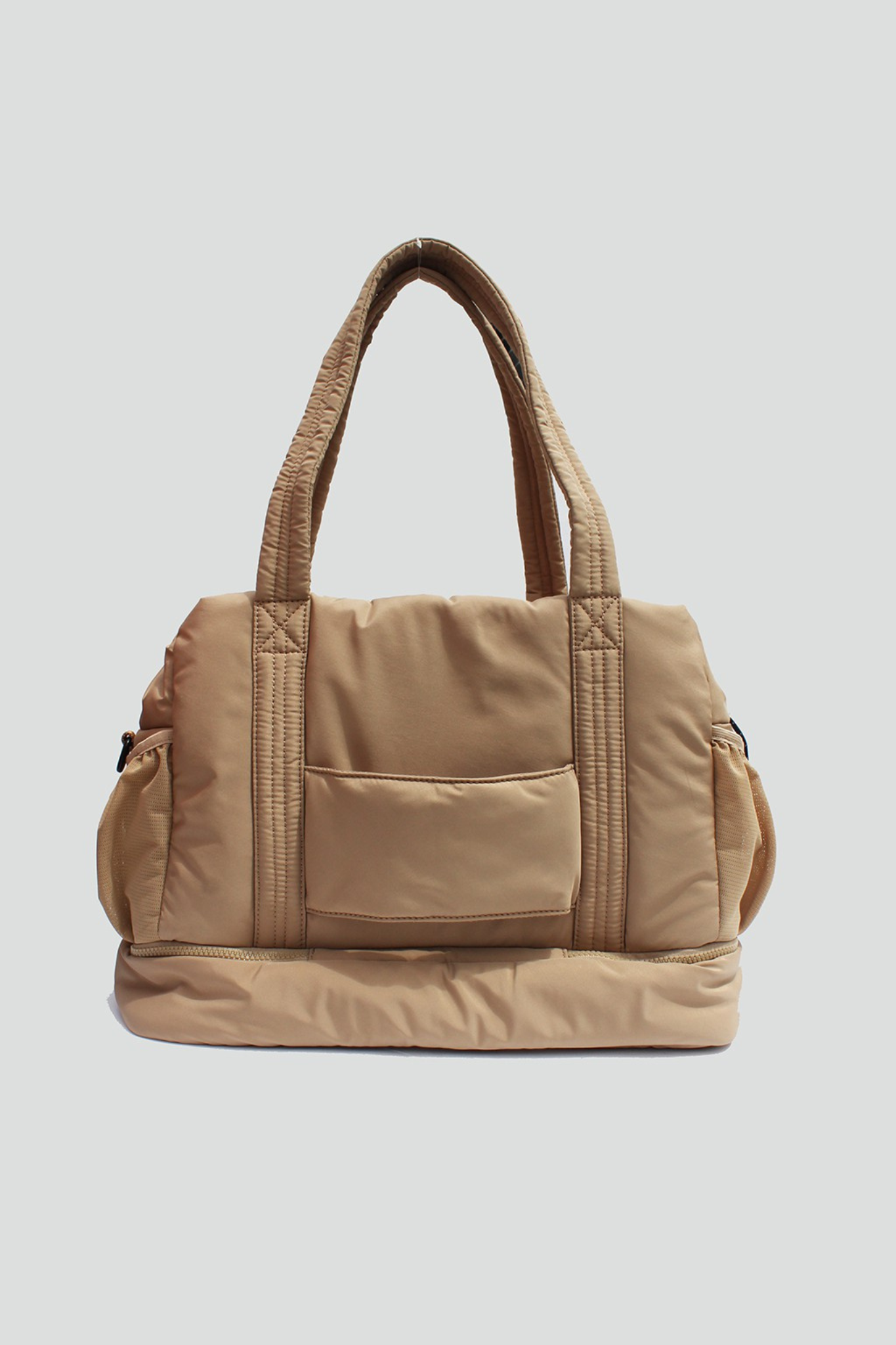 View 2 of Brooke Puffy Overnight Bag in Sand, a Bags from Larrea Cove. Detail: .