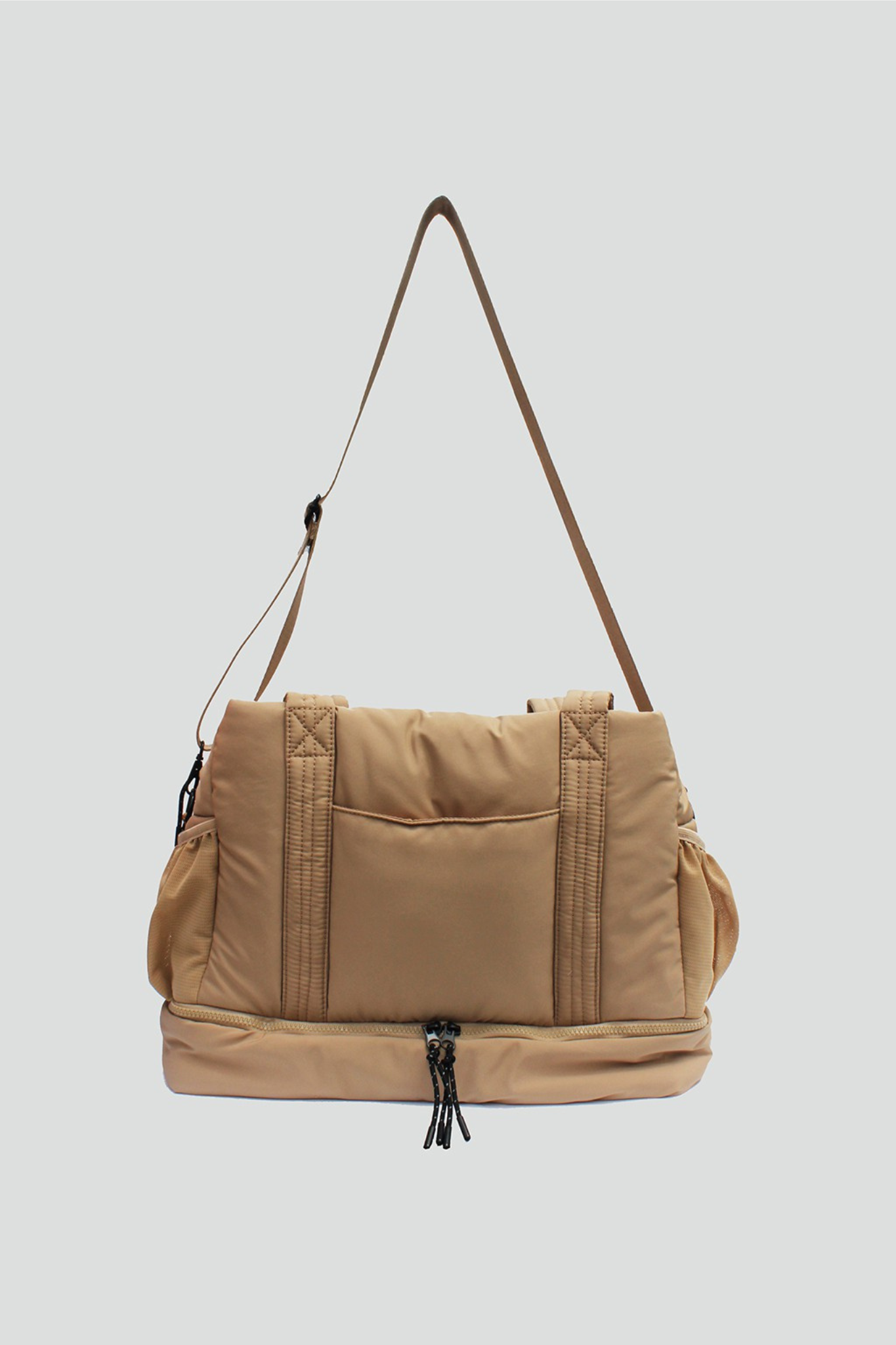View 3 of Brooke Puffy Overnight Bag in Sand, a Bags from Larrea Cove. Detail: .