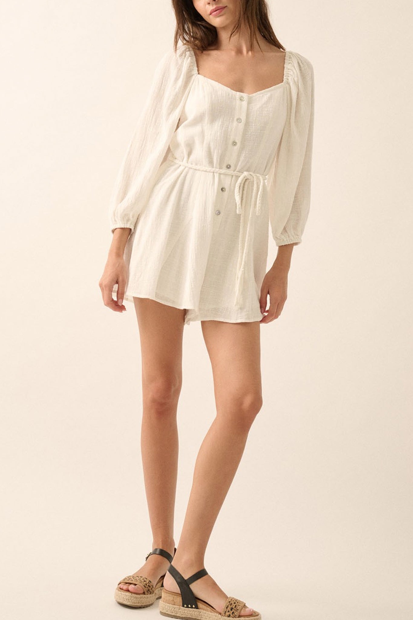 Embrace coastal elegance with Larrea Cove's bubble sleeve romper, a boho chic addition to your summer wardrobe