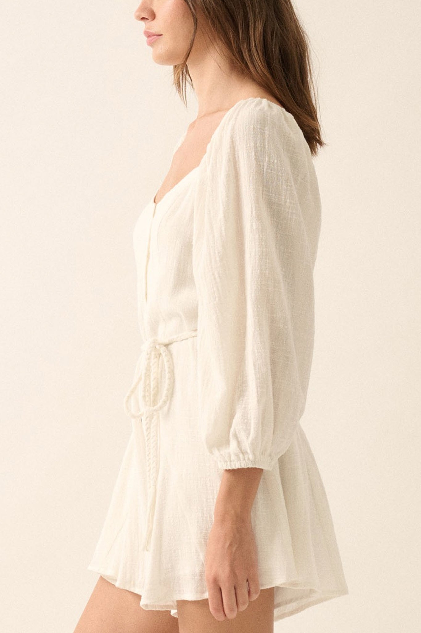 Effortlessly chic bubble sleeve romper in soft hues, perfect for coastal escapes and boho adventures. Larrea Cove new arrivals.