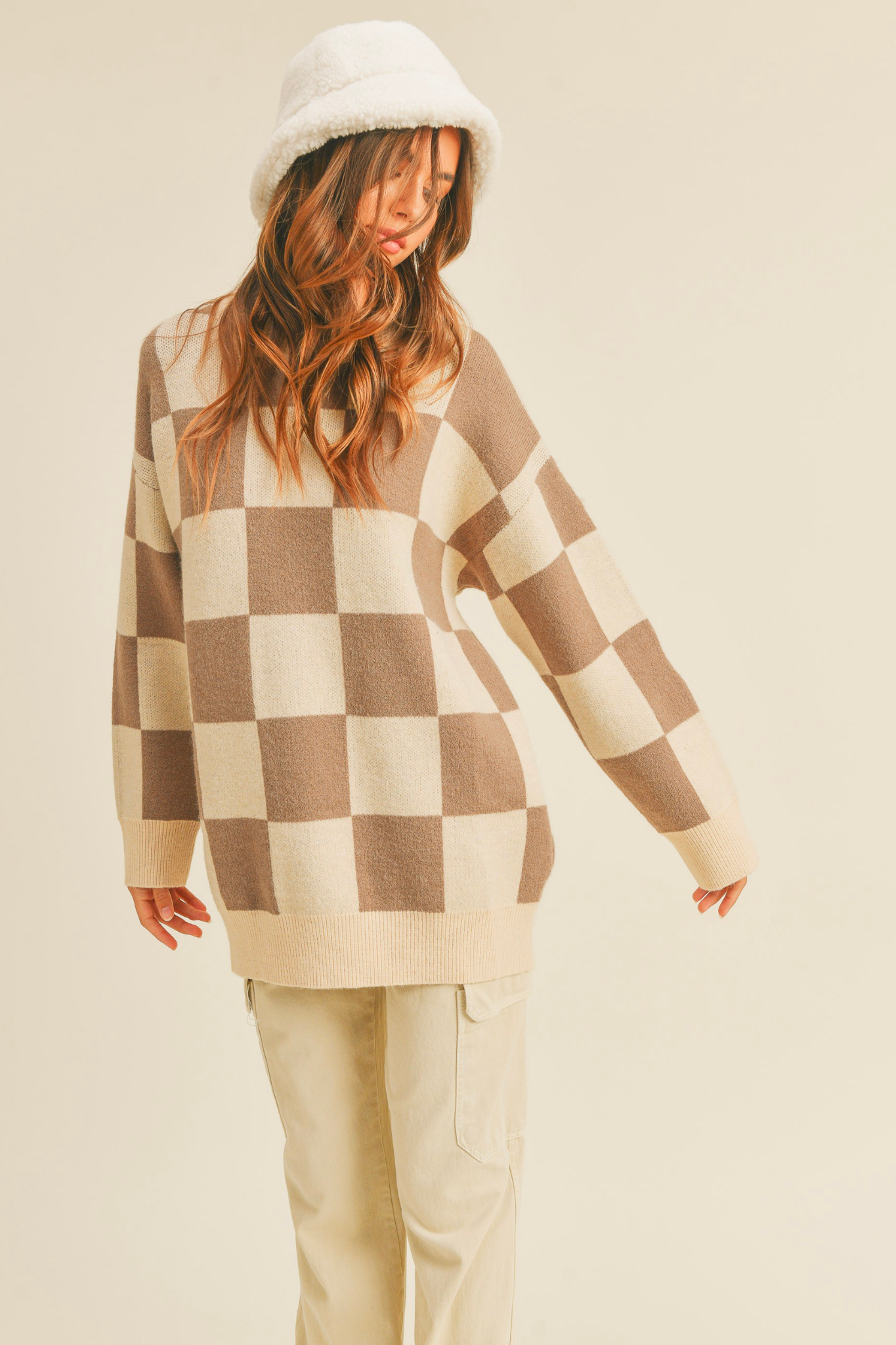 View 2 of Checkered Sweater Top, a nan from Larrea Cove. Detail: .