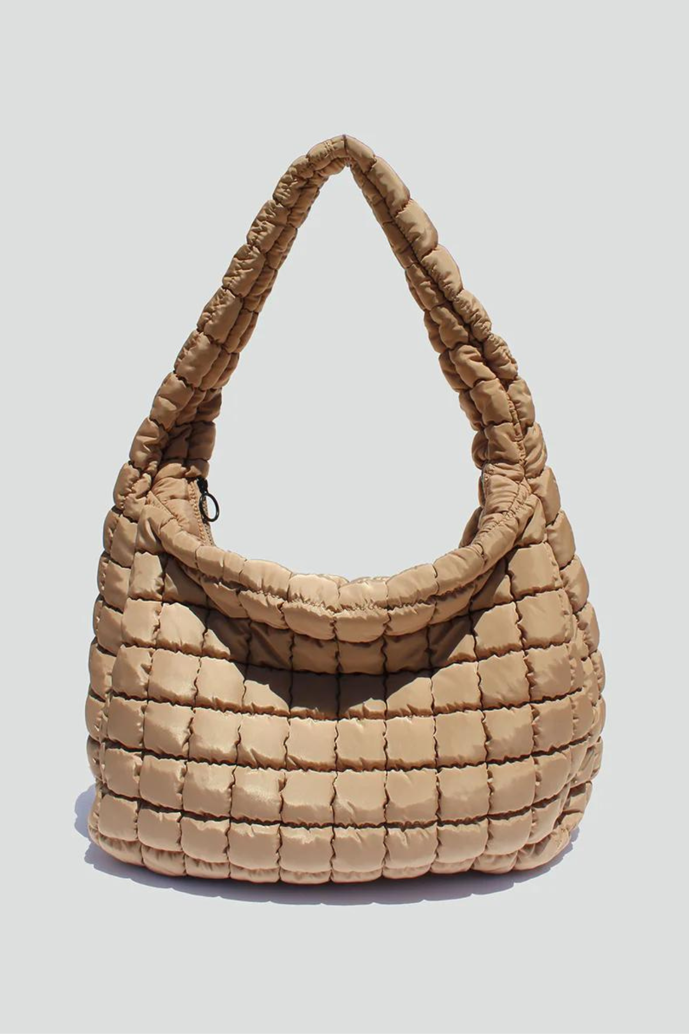 View 3 of Cleo Quilted Hobo Bag in Sand, a Bags from Larrea Cove. Detail: .