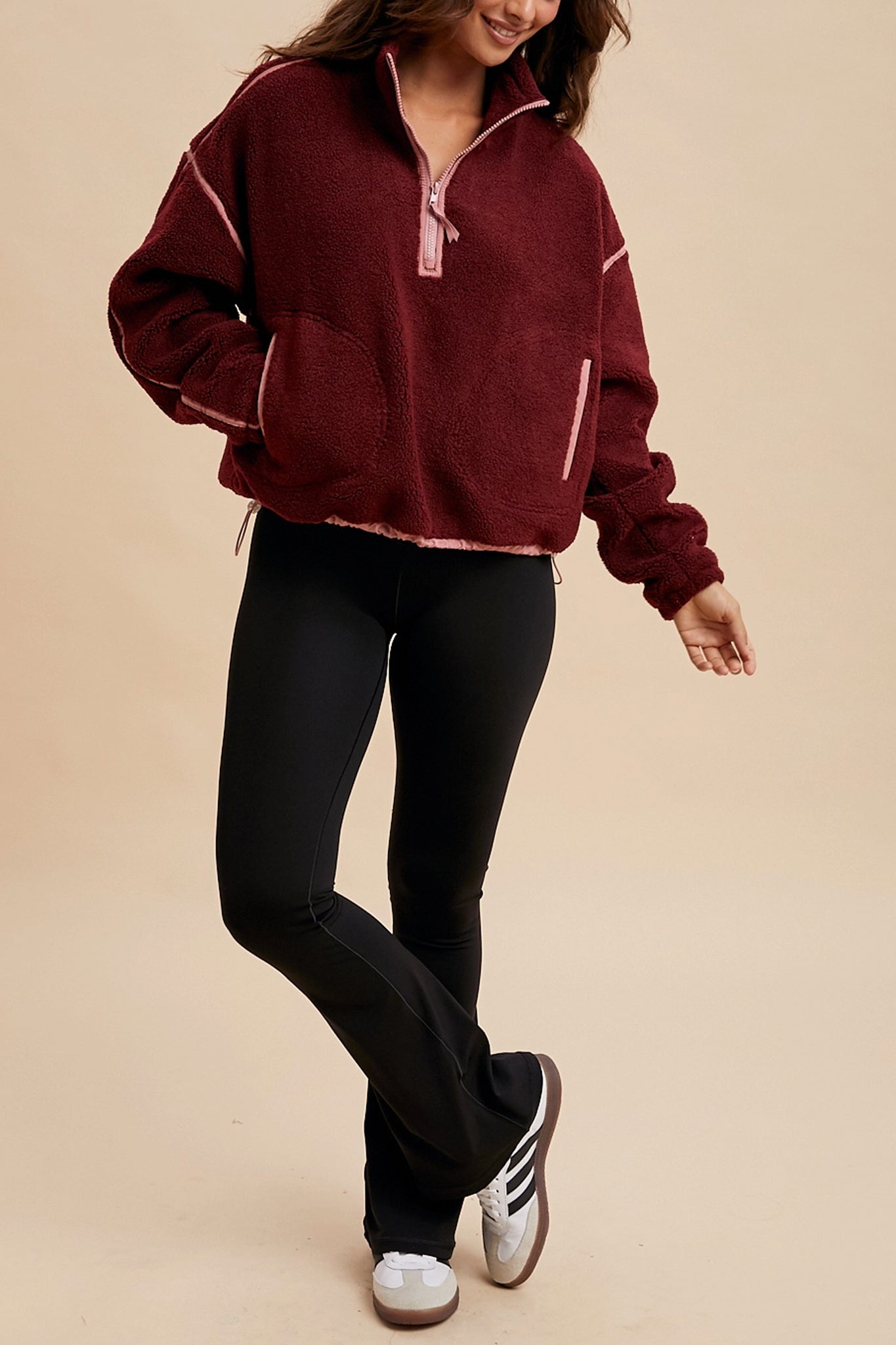 Larrea Cove's contrast sherpa quarter-zip pullover envelops you in cozy elegance, perfect for new-arrivals in outerwear collections