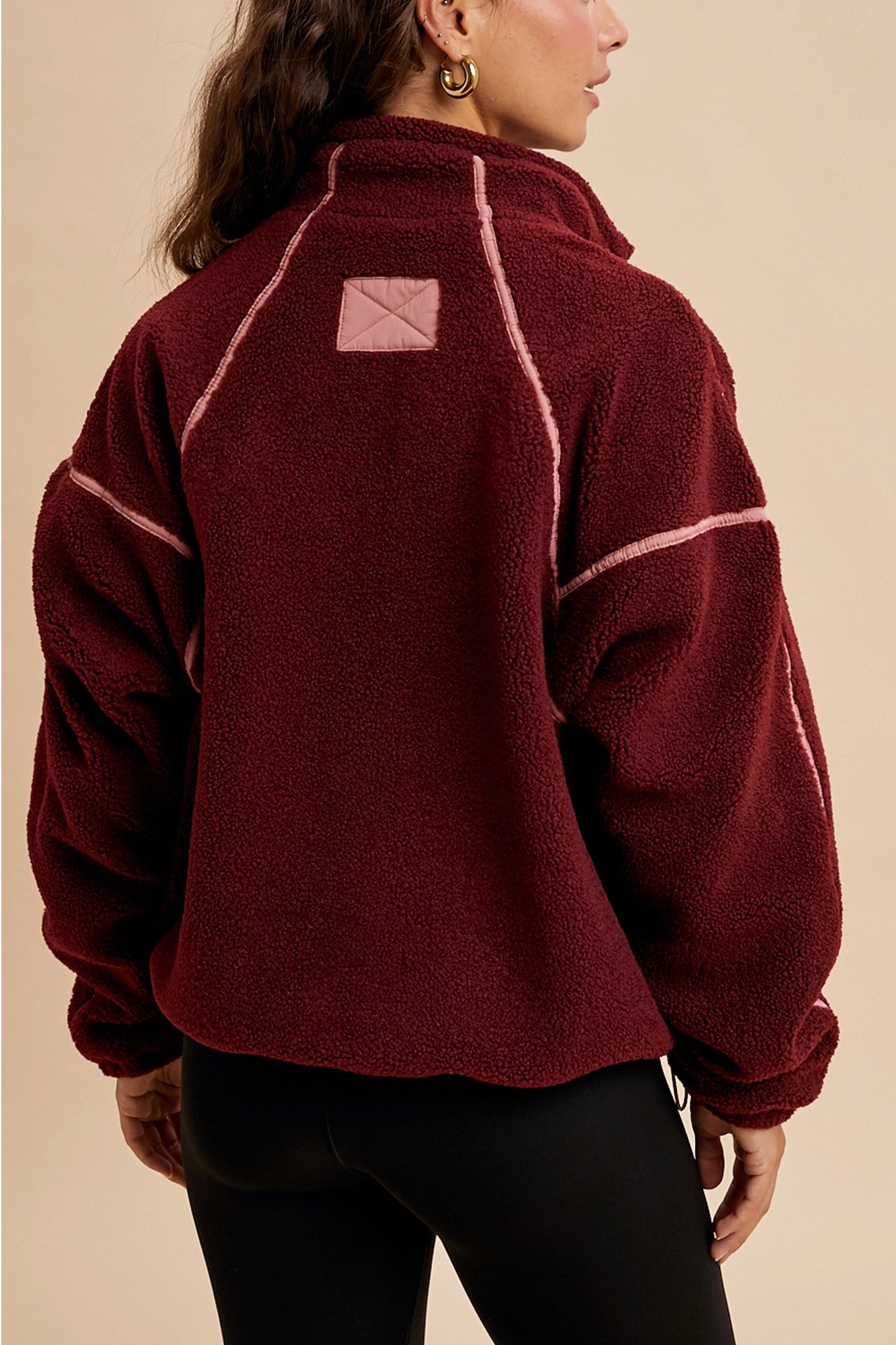 Embrace cool coastal breezes with Larrea Cove's contrast sherpa quarter-zip pullover, a cozy new-arrival in our outerwear collection.