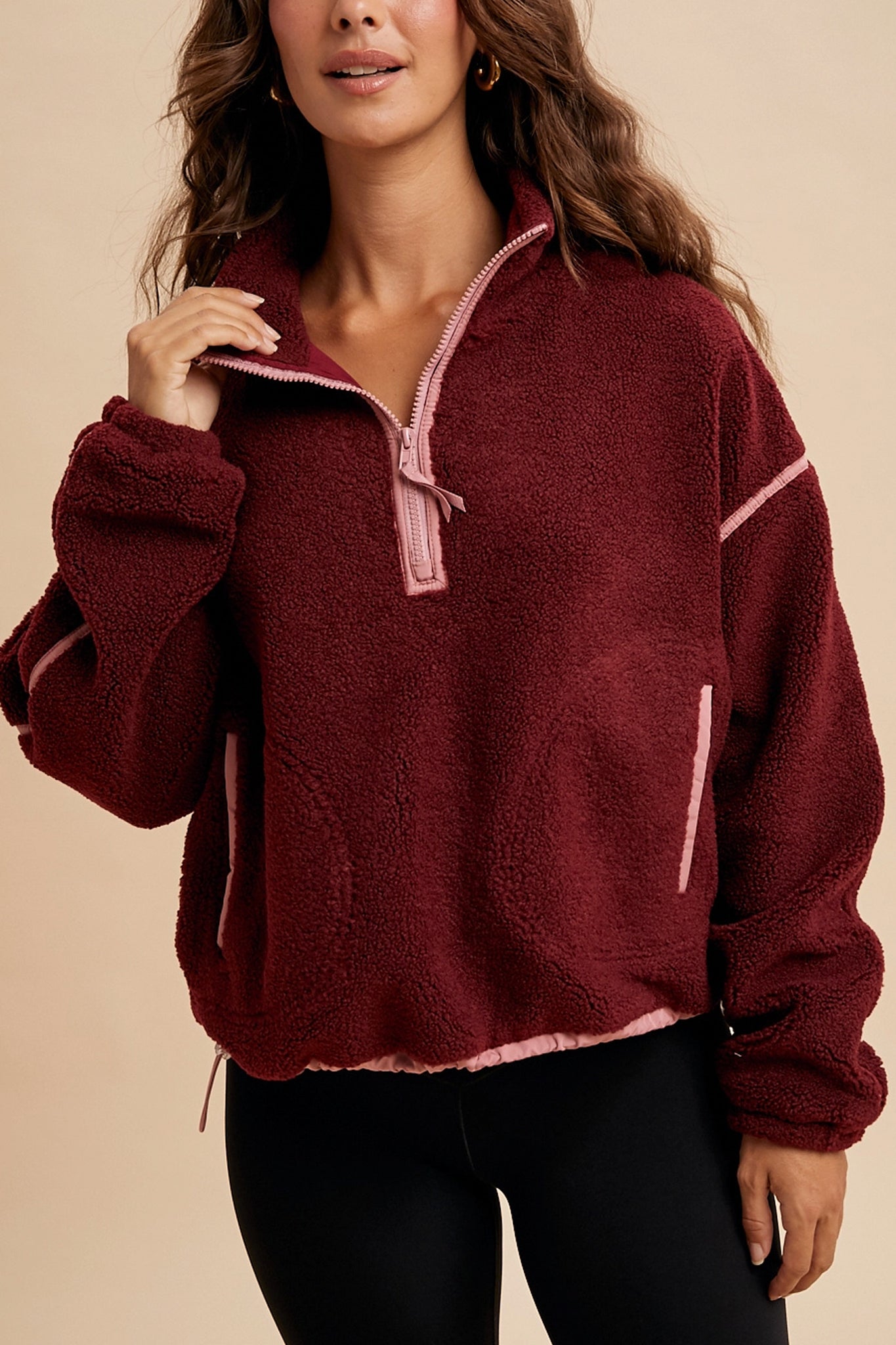 Experience cozy coastal vibes with Larrea Cove's contrast sherpa quarter-zip pullover, a new-arrival in our outerwear collection, perfect for layering.