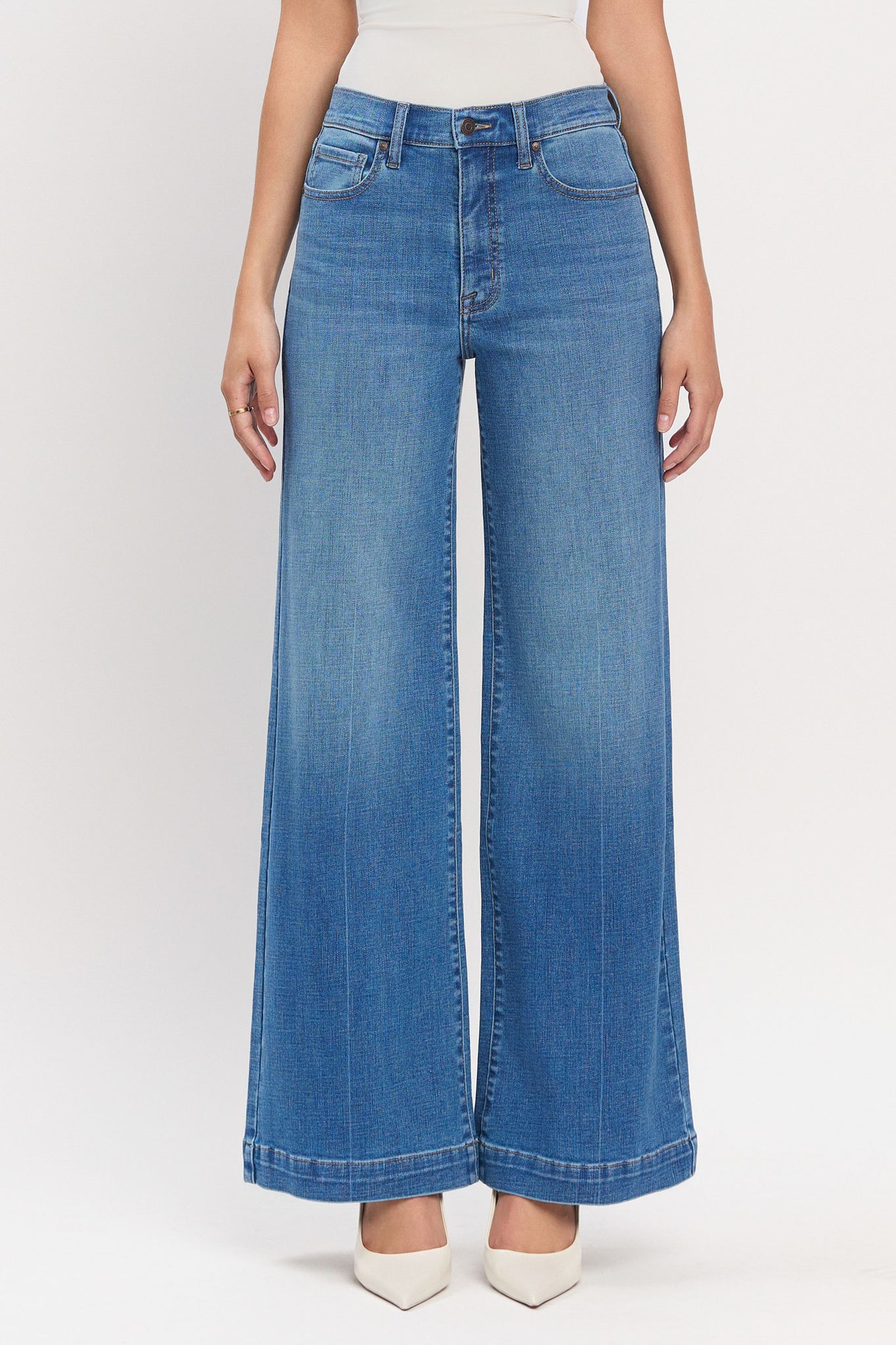 Eunina Chloe Super High Rise Trouser in Alder, featuring medium wash denim with light fading, wide trouser hem, five-pocket design, belt loops, and hidden zip fly button closure. The trousers have an 11-inch super high rise, 32-inch inseam, and 24-inch leg opening, made of 98% cotton and 2% spandex.
