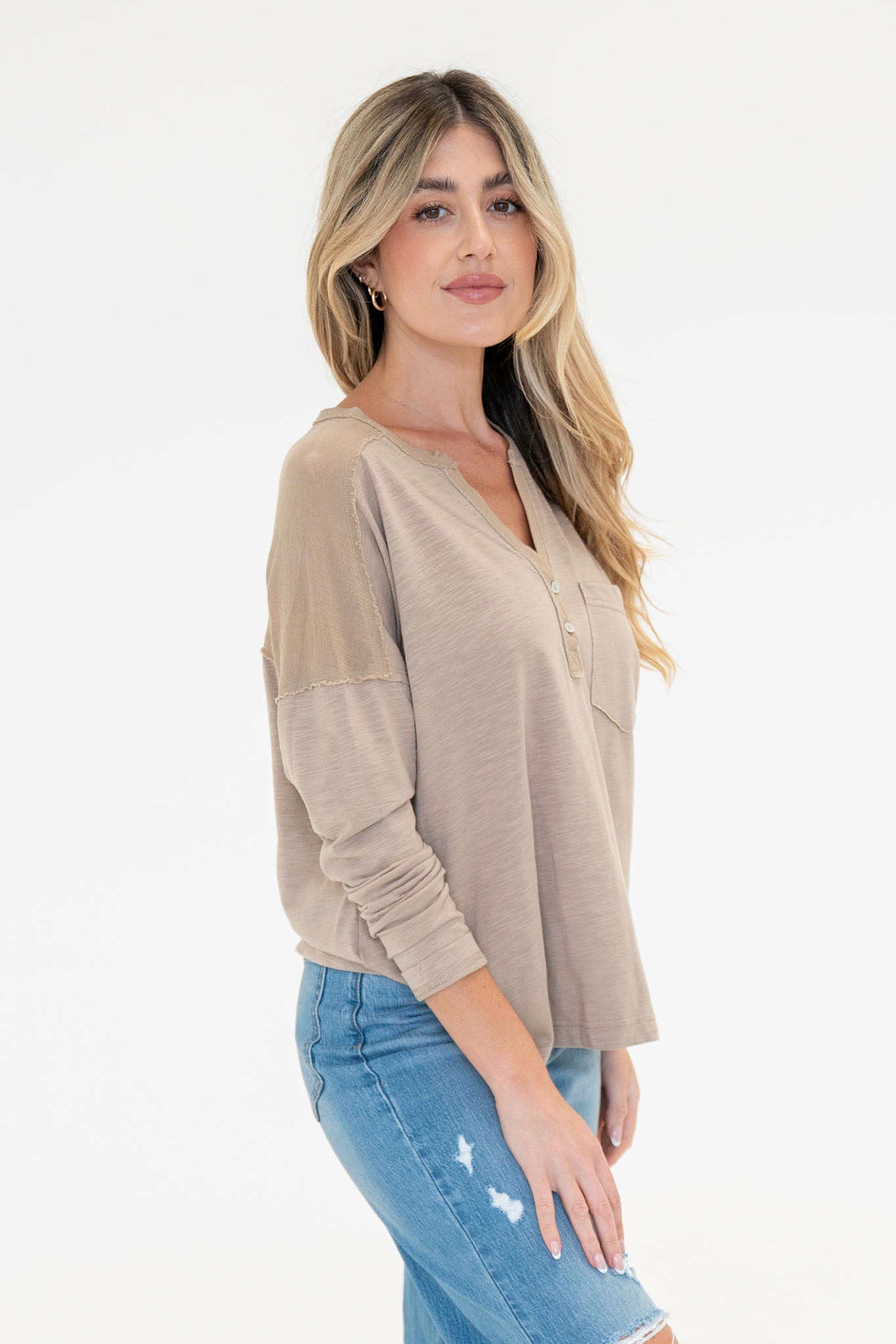 View 4 of Freesia Henley in Taupe, a Tops from Larrea Cove. Detail: .