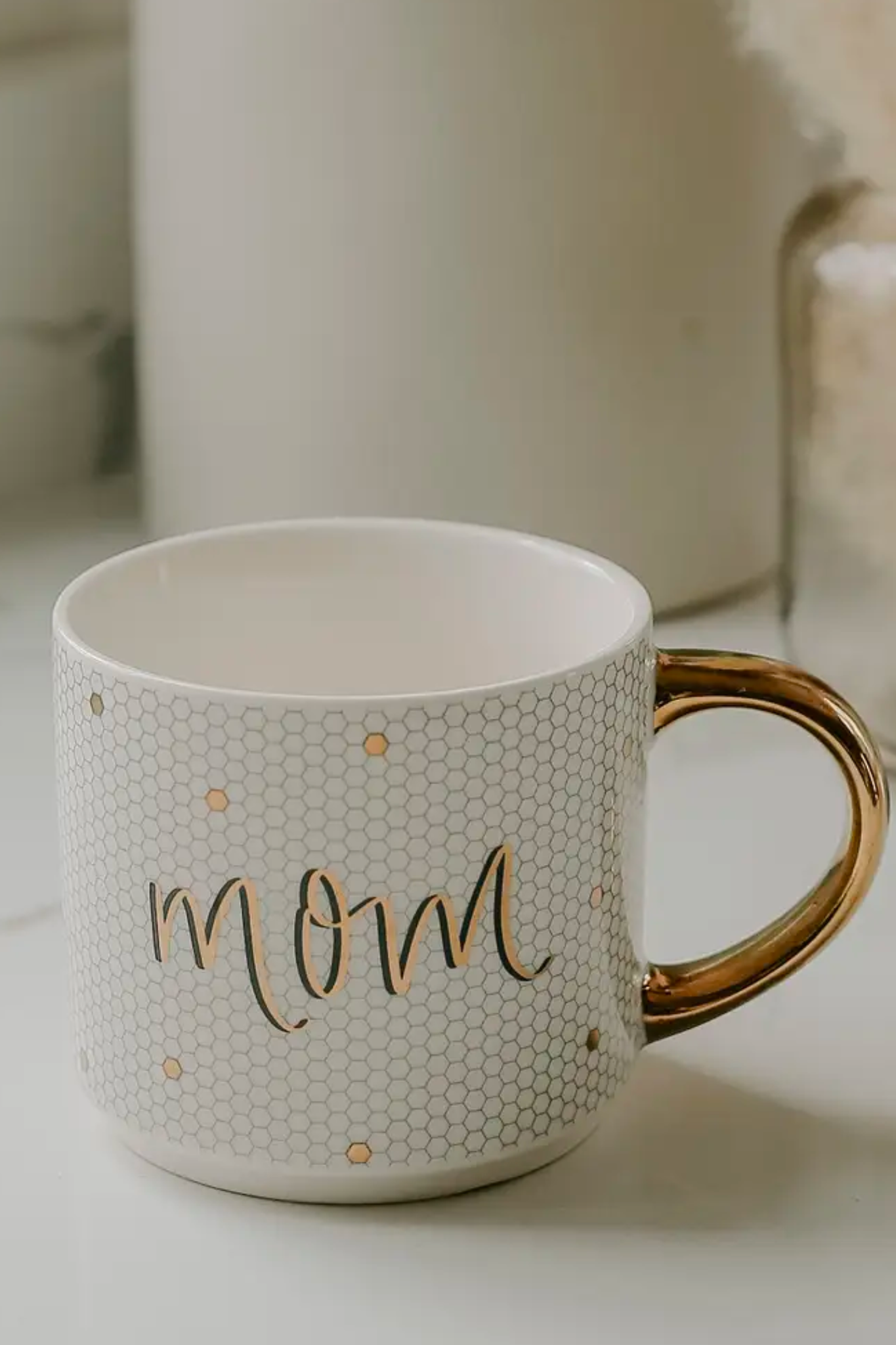 View 1 of Mom Tiled Mug, a Home & Decor from Larrea Cove. Detail: The Mom Tiled Mug from brings sophistication and style to mornings or afternoo...