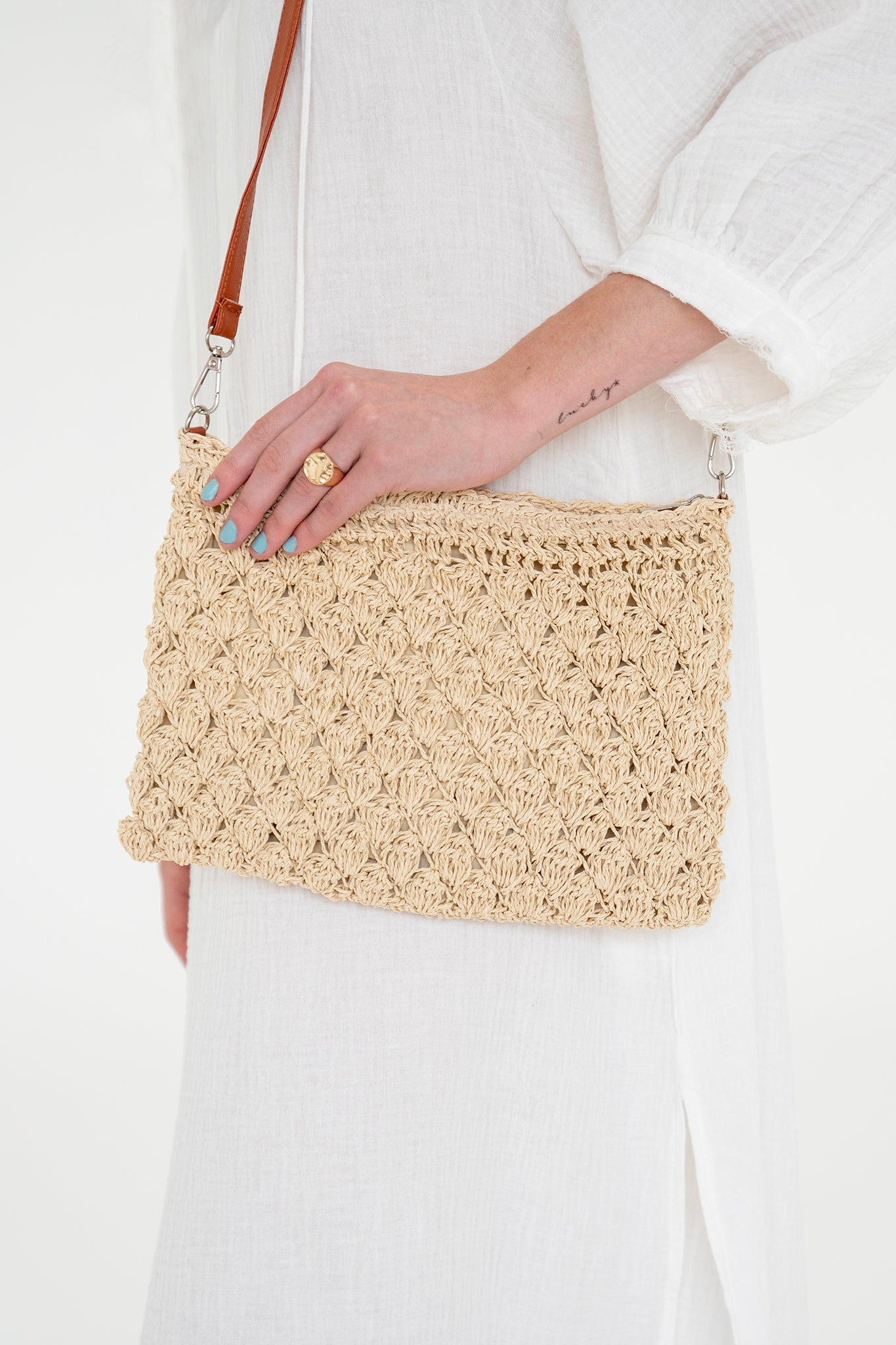 View 3 of Muilla Straw Crossbody Bag, a Bags from Larrea Cove. Detail: .