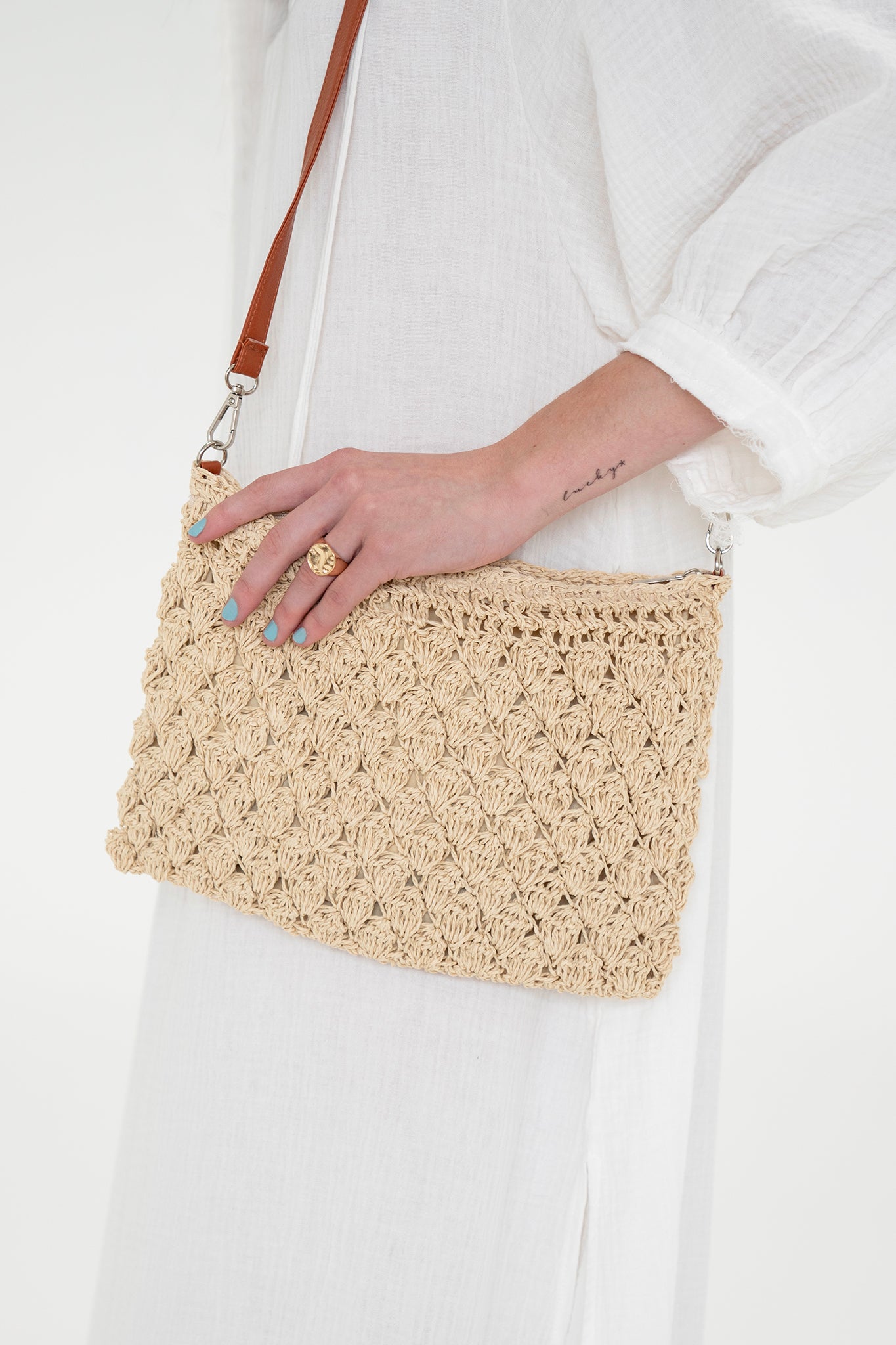 View 1 of Muilla Straw Crossbody Bag, a Bags from Larrea Cove. Detail: 
Summer is here and it’s time...