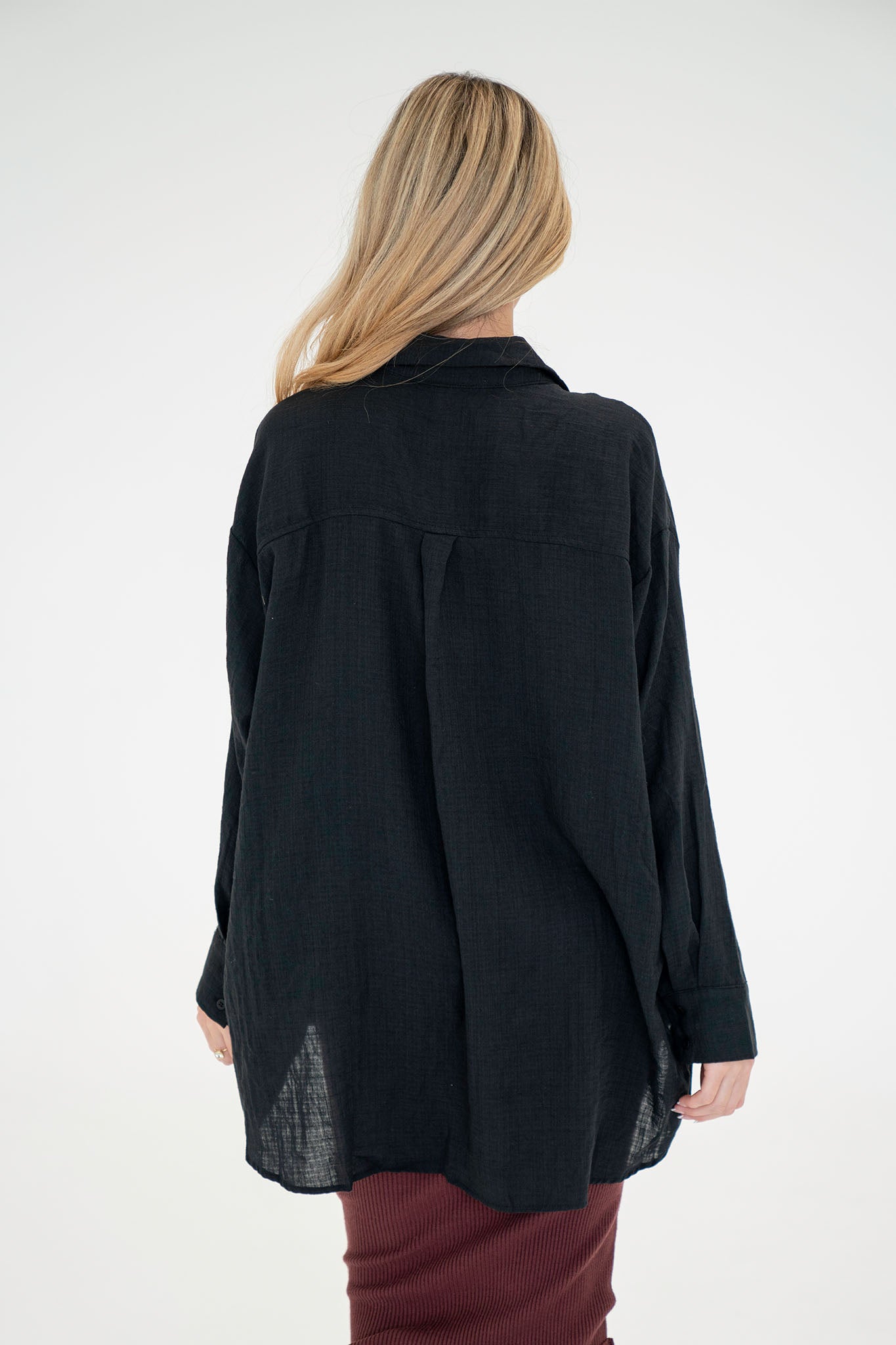 View 3 of Sea Campion Oversized Shirt in Black, a Tops from Larrea Cove. Detail: .