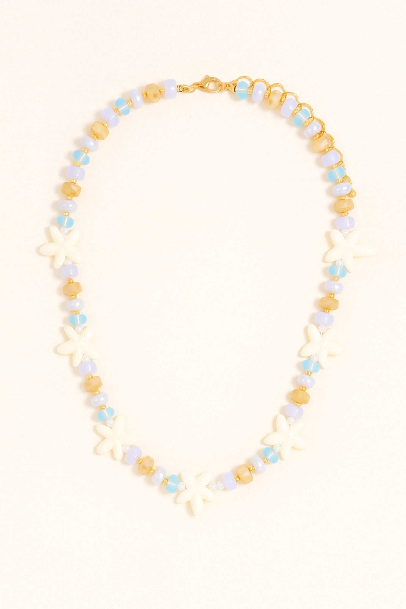 Elegant starfish bead necklace from Larrea Cove's new arrivals, featuring coastal charm with delicate ocean-inspired details.